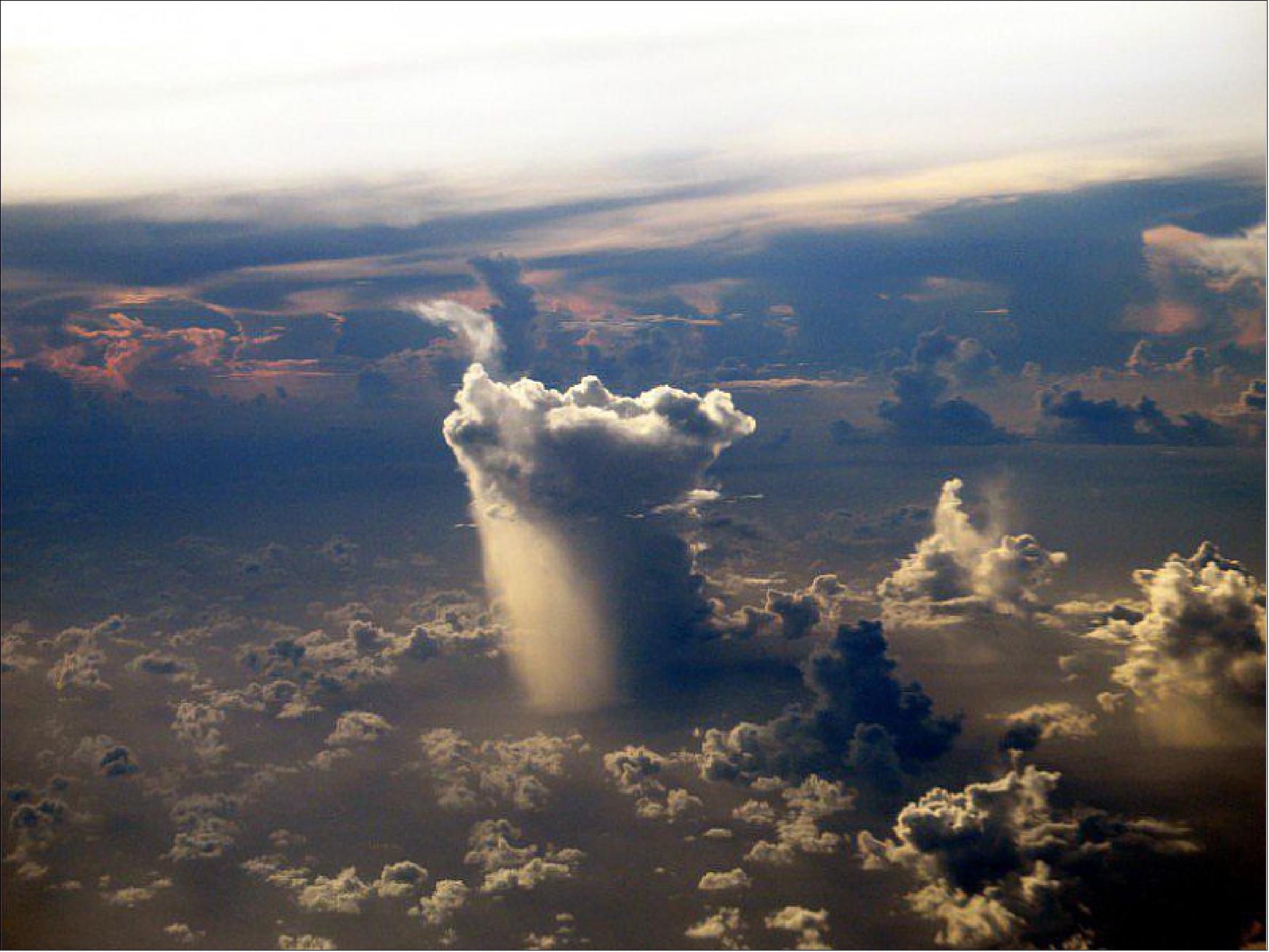 Figure 12: A lone storm cloud over the Pacific Ocean dumps freshwater into the sea (image credit: borto) 20)