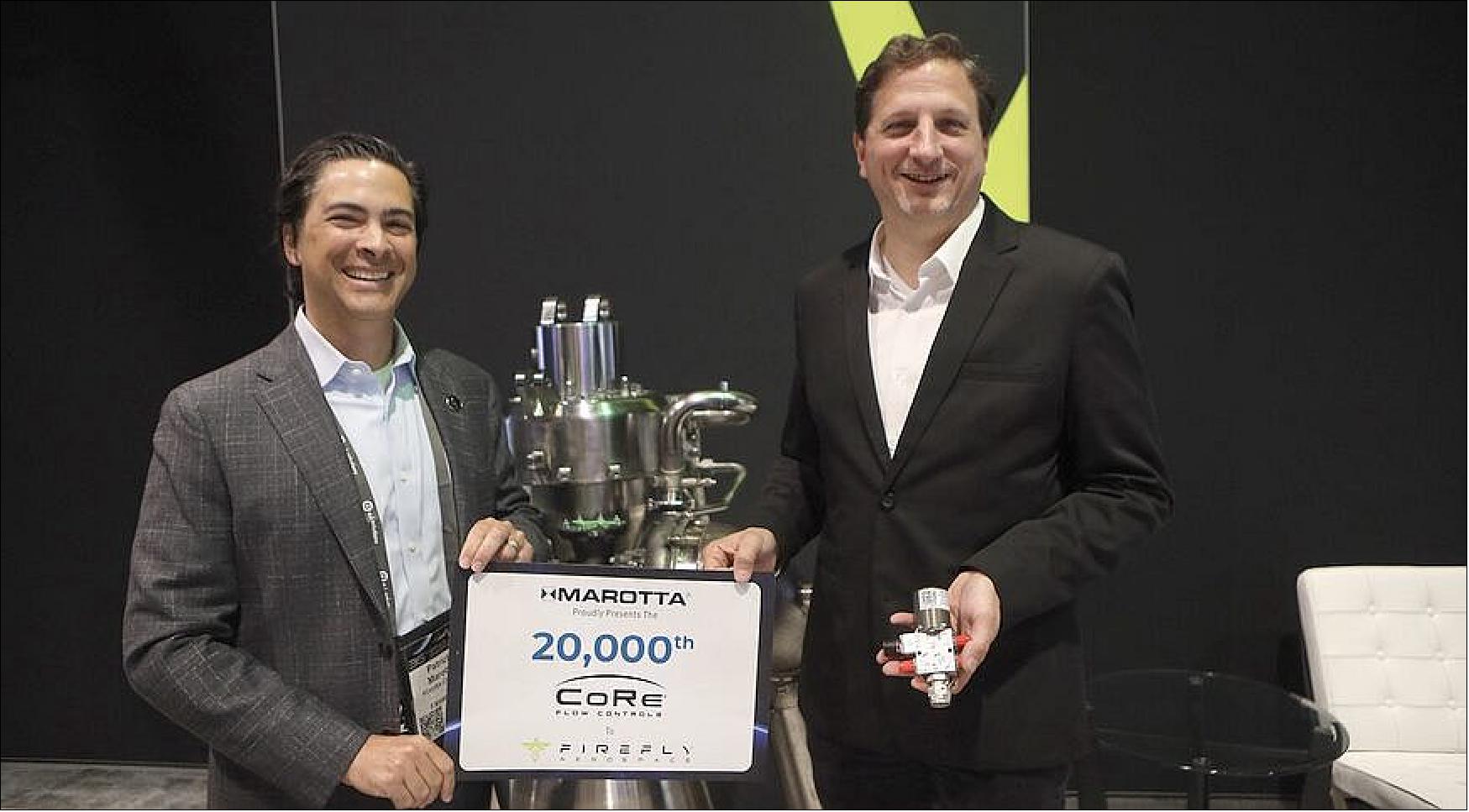 Figure 3: Firefly CEO Tom Markusic (right) took delivery of Marotta Controls' 20,000th CoRe Flow Controls valve from its CEO, Patrick Marotta, during a ceremony at the 36th Space Symposium Aug. 24 (image credit: Thomas Kimmell)