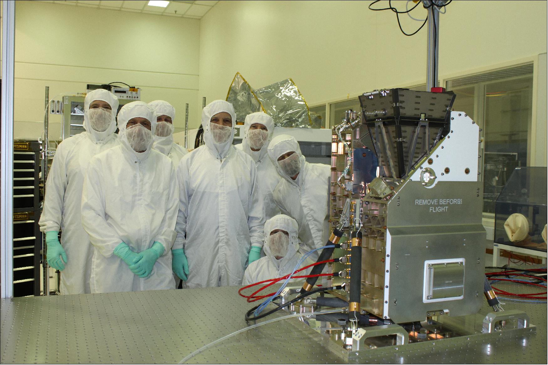 Figure 9: Members of the GOLD science team gather with the instrument in a LASP clean room on December 1, 2016, just after the instrument went through its pre-ship review ahead of shipment to Airbus Defence and Space in Toulouse, France (image credit: LASP)
