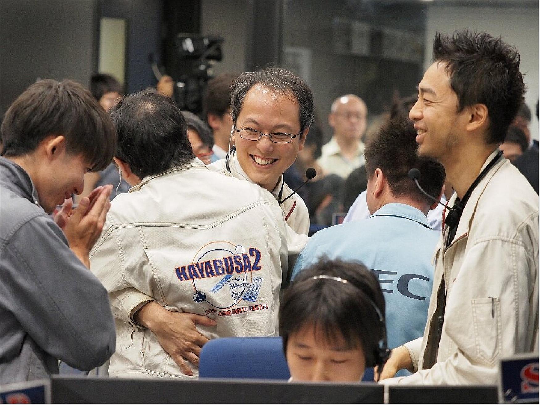 Figure 51: Officials from Japan's space agency celebrated news of Hayabusa-2's successful second touchdown on the asteroid Ryugu (image credit: JAXA)