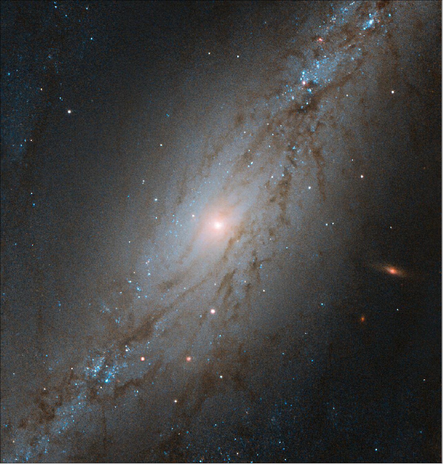 Figure 49: Captured by the NASA/ESA Hubble Space Telescope, this image shows NGC 7513, a barred spiral galaxy. Located approximately 60 million light-years away, NGC 7513 lies within the Sculptor constellation in the southern hemisphere (image credit: ESA/Hubble & NASA, M. Stiavelli; CC BY 4.0)