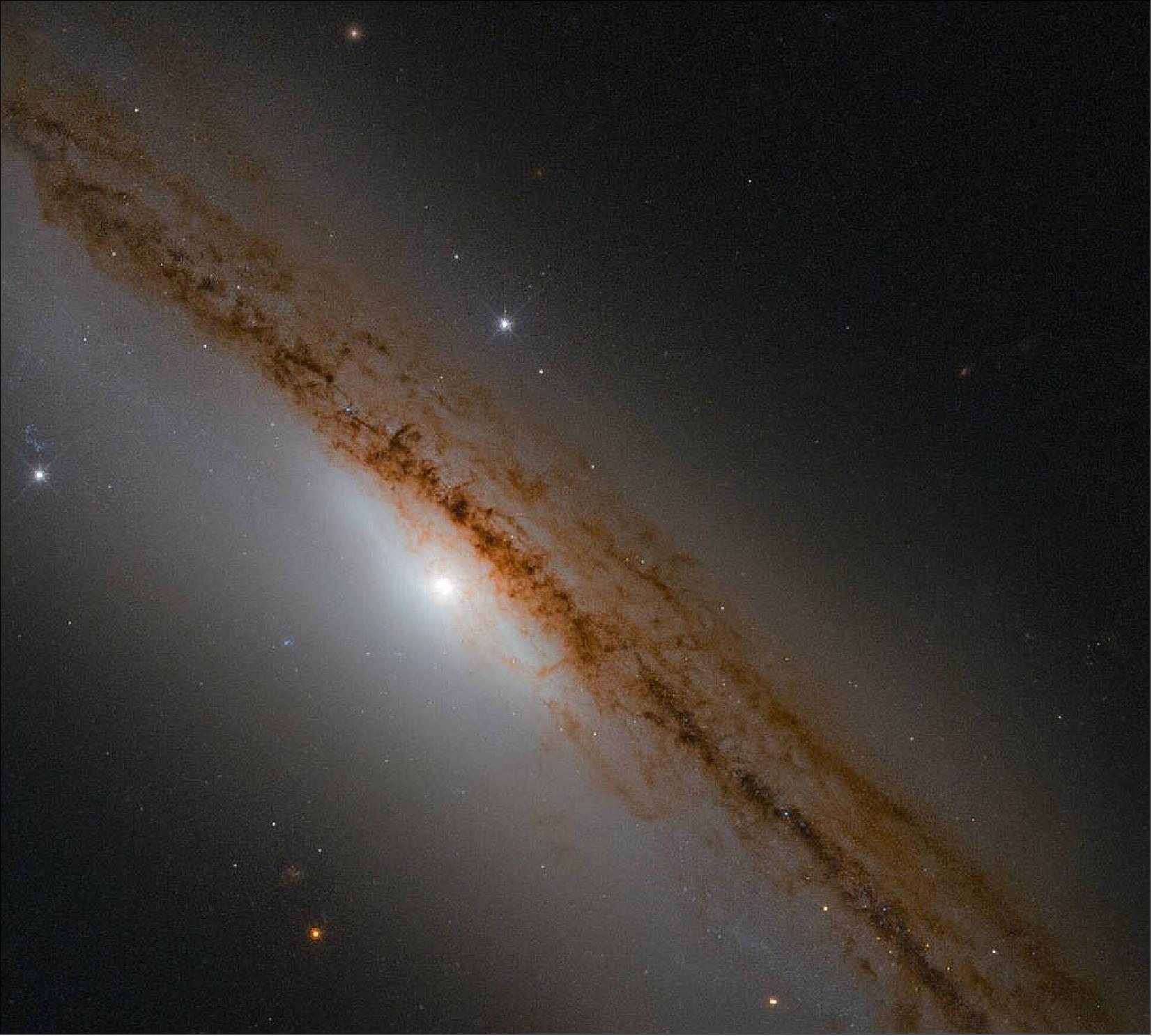 Figure 87: The subject of this image taken by the NASA/ESA Hubble Space Telescope, a spiral galaxy named NGC 1589, was once the scene of a violent bout of cosmic hunger pangs. As astronomers looked on, a poor, hapless star was seemingly torn apart and devoured by the ravenous supermassive black hole at the center of the galaxy (image credit: ESA/Hubble & NASA; CC BY 4.0)