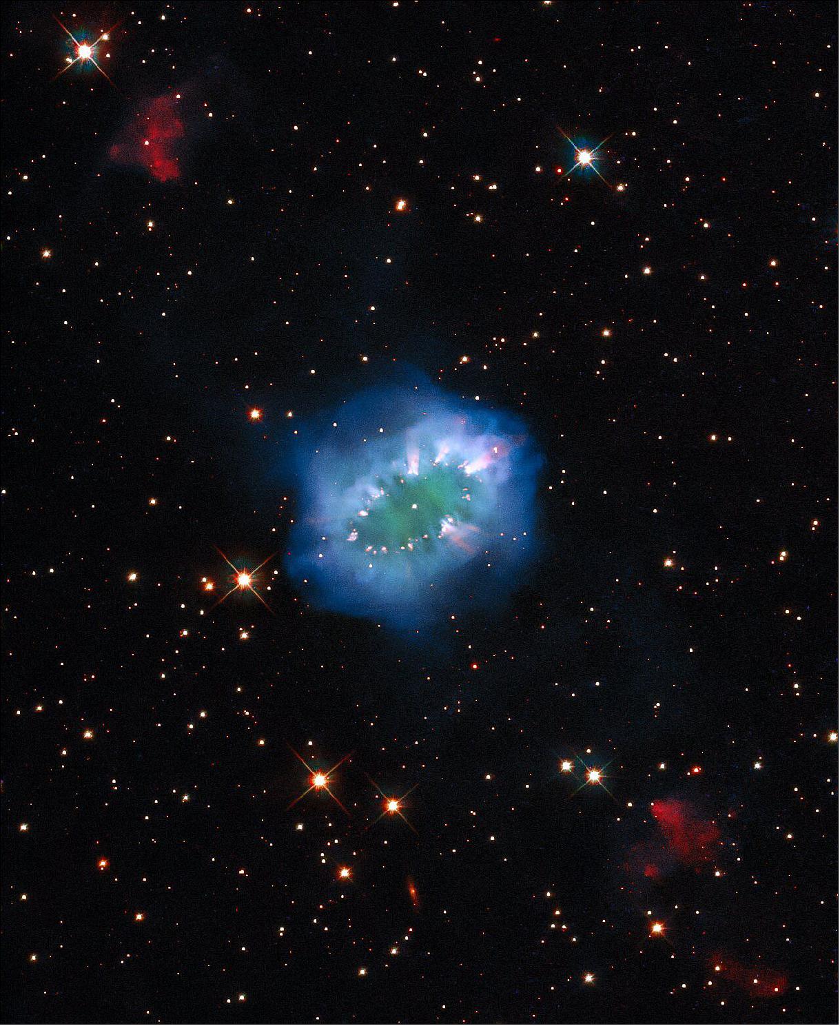 Figure 89: The interaction of two doomed stars has created this spectacular ring adorned with bright clumps of gas — a diamond necklace of cosmic proportions. Fittingly known as the Necklace Nebula, this planetary nebula is located 15,000 light-years away from Earth in the small, dim constellation of Sagitta (The Arrow), image credit: ESA/Hubble & NASA, K. Noll; CC BY 4.0)