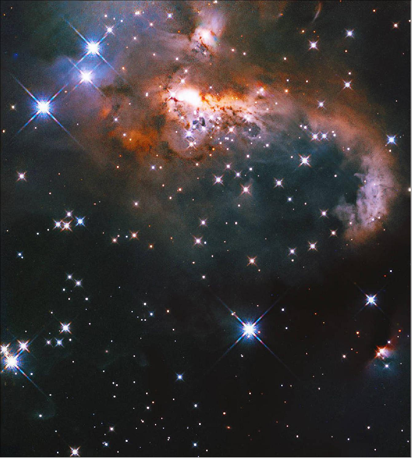 Figure 26: Hubble surveys a snowman sculpted from gas and dust [image credit: NASA, ESA, and J. Tan (Chalmers University of Technology); Processing; Gladys Kober (NASA/Catholic University of America)]