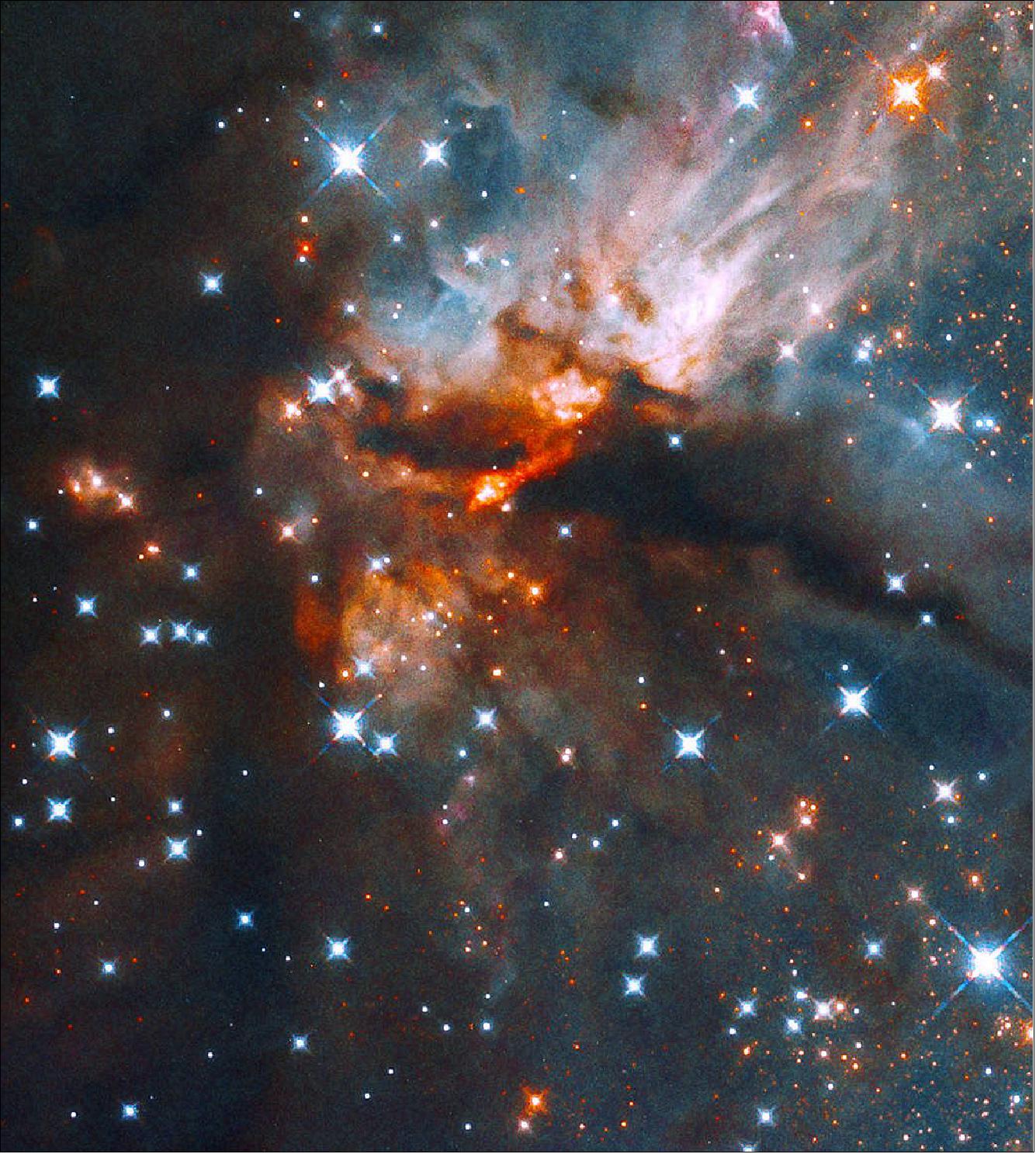 Figure 19: Researchers combined infrared observations from Hubble with those from radio telescopes in order to see inside these dusty star-forming regions. They found a jet of material with properties similar to jets associated with young, low-mass stars. This implies that the mechanism creating the light emitted by these jets is similar in young stars of different masses, up to 10 times the mass of the Sun [image credit: NASA, ESA, and J. Tan (Chalmers University of Technology); Processing; Gladys Kober (NASA/Catholic University of America)]