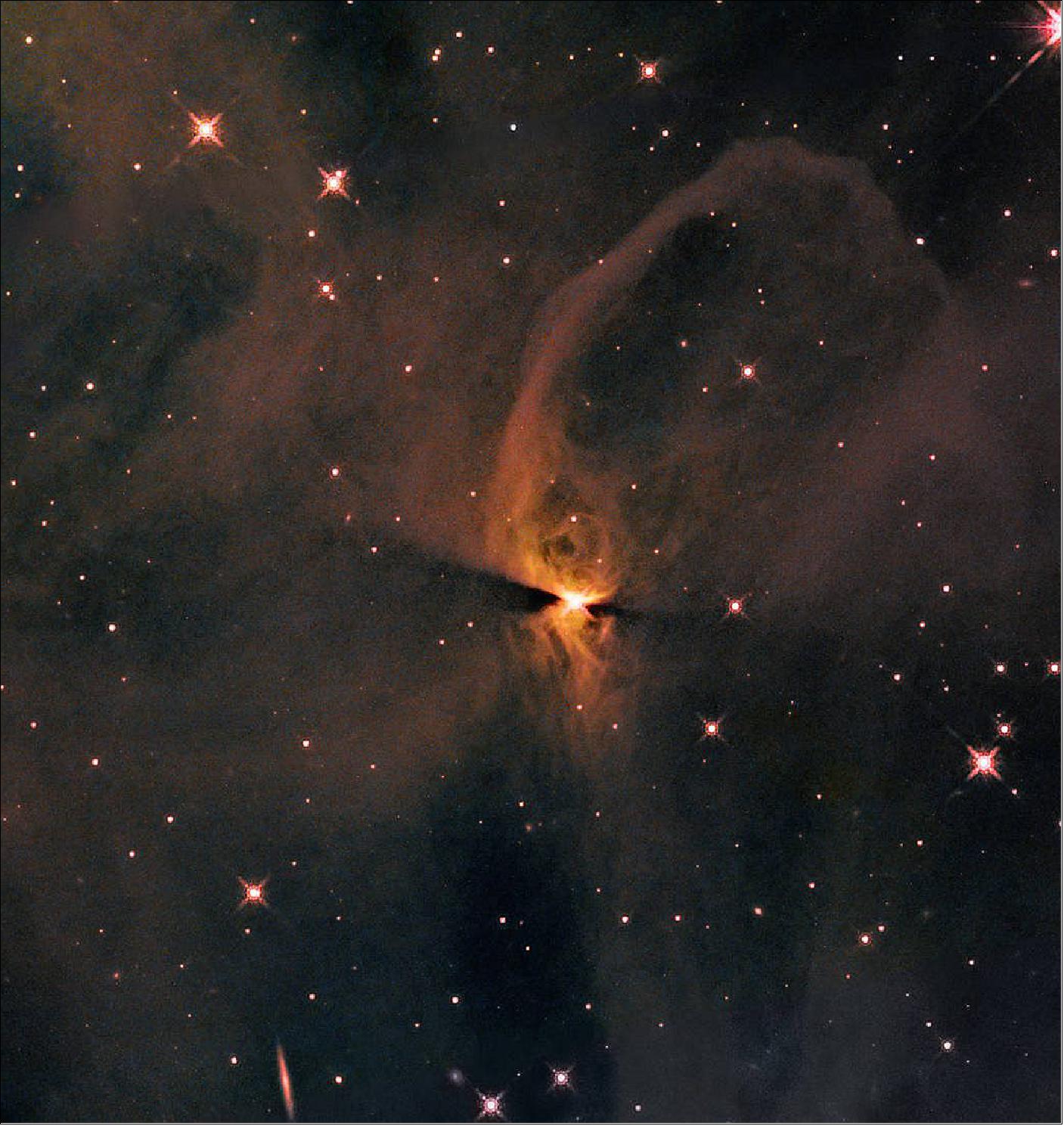 Figure 17: This Hubble infrared image captures a protostar designated J1672835.29-763111.64 in the reflection nebula IC 2631, part of the Chamaeleon star-forming region in the southern constellation Chamaeleon. Protostars shine with the heat energy released by clouds contracting around them and the accumulation of material from the nearby gas and dust. Eventually enough material collects, and the core of a protostar becomes hot and dense enough for nuclear fusion to begin, and the transformation into a star is complete. The leftover gas and dust can become planets, asteroids, comets, or remain as dust [image credit: NASA, ESA, T. Megeath (University of Toledo), and K. Stapelfeldt (Jet Propulsion Laboratory); Processing: Gladys Kober (NASA/Catholic University of America)]