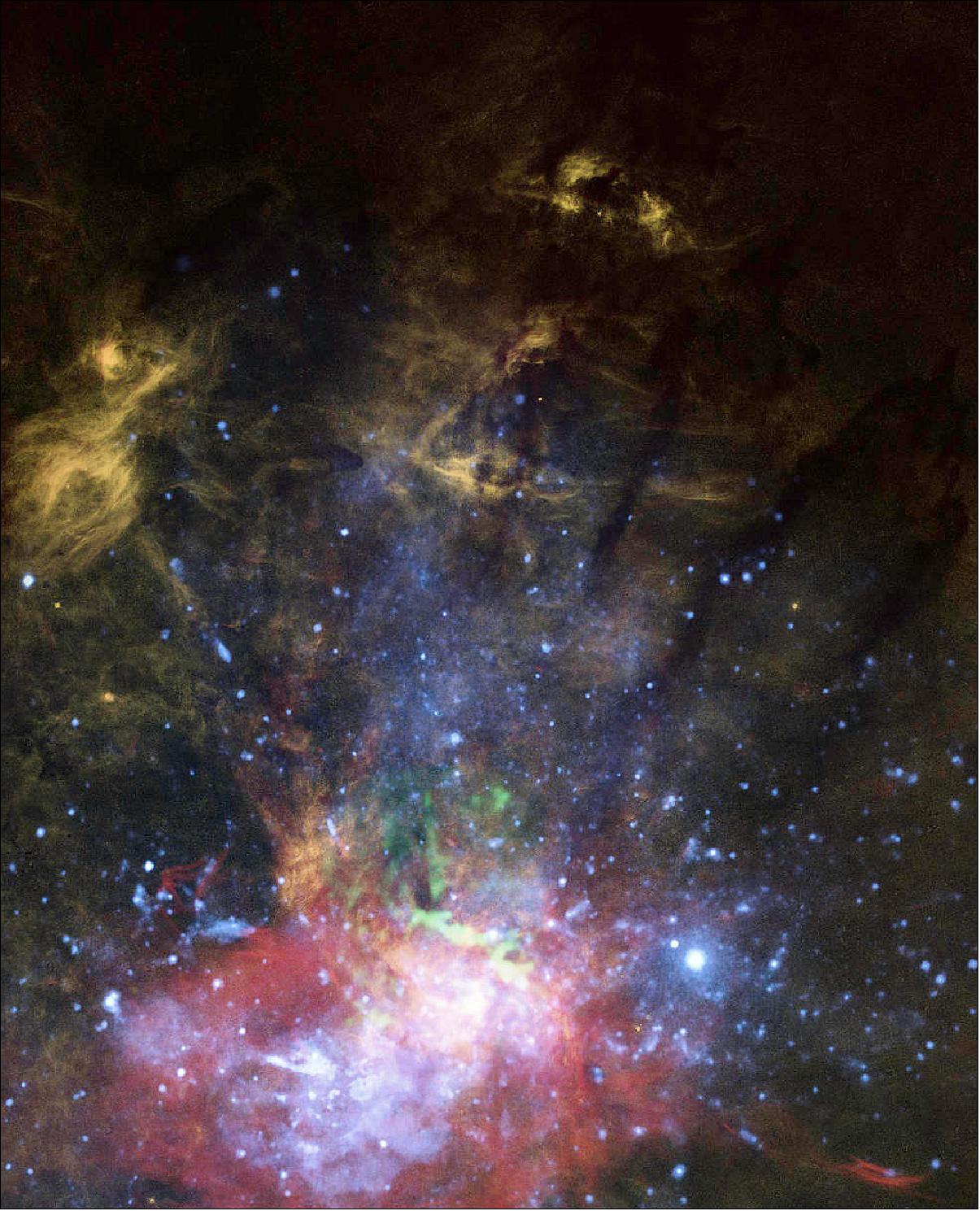 Figure 4: This is a composite view of X-rays, molecular gas, and warm ionized gas near the galactic center. The orange-colored features are of glowing hydrogen gas. One such feature, at the top tip of the jet (see the annotated image in Figure 5) is interpreted as a hydrogen cloud that has been hit by the outflowing jet. The jet scatters off the cloud into tendrils that flow northward. Farther down near the black hole are X-ray observations of superheated gas colored blue and molecular gas in green. These data are evidence that the black hole occasionally accretes stars or gas clouds, and ejects some of the superheated material along its spin axis [image credits: NASA, ESA, and Gerald Cecil (UNC-Chapel Hill); Image Processing: Joseph DePasquale (STScI)]