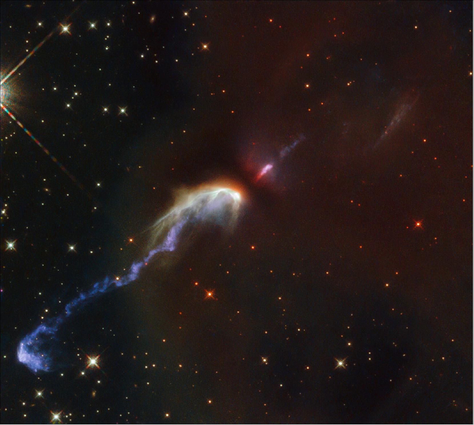 Figure 115: Herbig-Haro objects are some of the rarer sights in the night sky, taking the form of thin spindly jets of matter floating amongst the surrounding gas and stars. The two Herbig-Haro objects catalogued as HH46 and HH47, seen in this image taken with the NASA/ESA Hubble Space Telescope, were spotted in the constellation of Vela (The Sails), at a distance of over 1400 light-years from Earth. Prior to its discovery in 1977 by the American astronomer R. D. Schwartz, the exact mechanism by which these multi-colored objects formed was unknown (image credit: ESA/Hubble & NASA, B. Nisini)