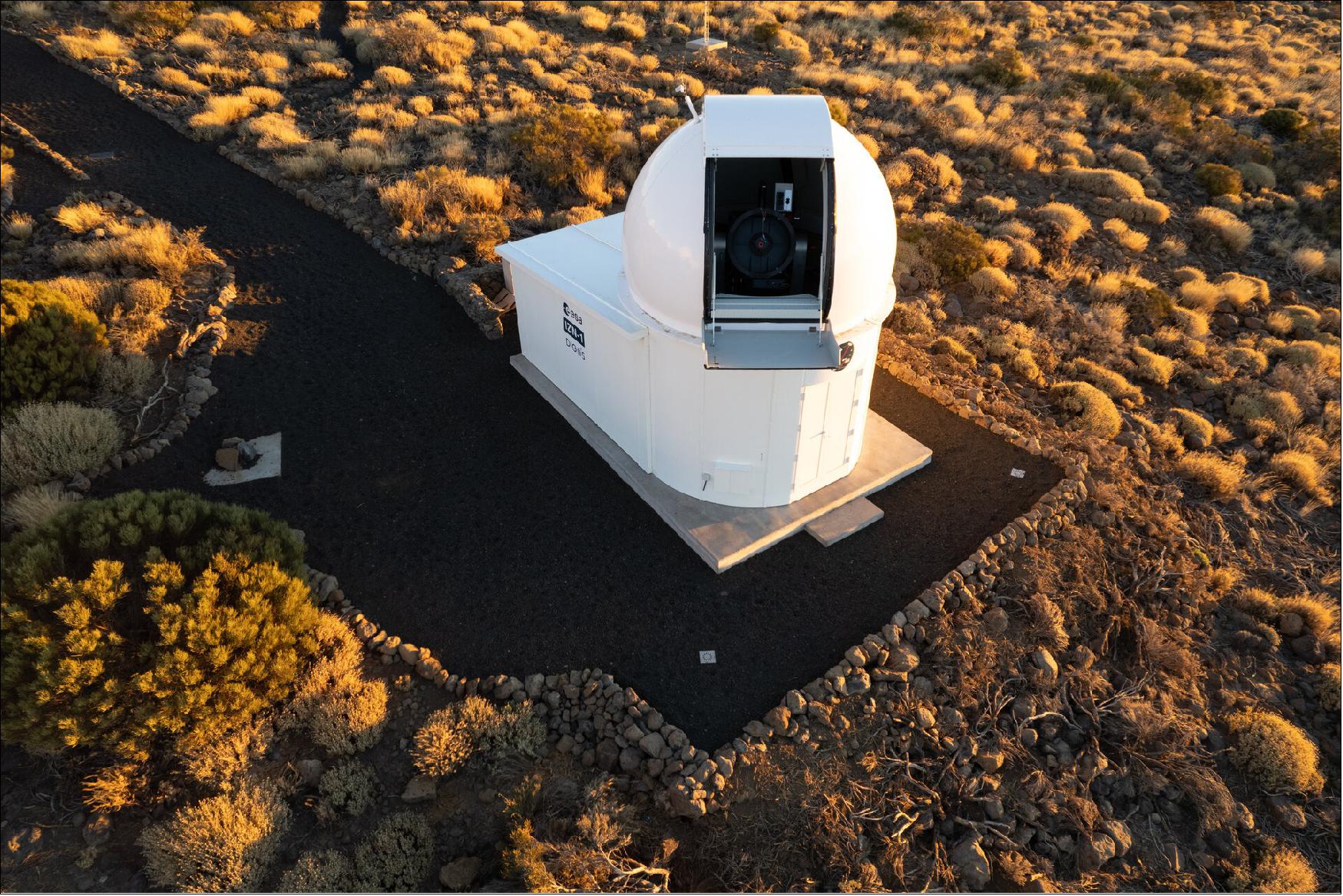 Figure 4: ESA's IZN-1 laser ranging station on top of the Izaña mountain in Tenerife, Spain, has recently undergone months of testing and commissioning, passing its final tests with flying colours. As it reached ‘station acceptance’, it was handed over to ESA from the German company contracted to build it, DiGOS. The station is a technology test bed and a vital first step in making debris mitigation widely accessible to all space actors with a say in the future of our space environment (image credit: ESA)
