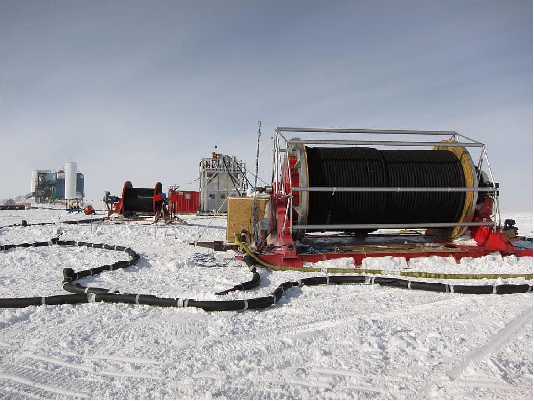 Figure 5: The hose reel, front right, held 2,500 meters of 10 cm diameter high-pressure hose for the drilling operations (image credit: J. Haugen/NSF)