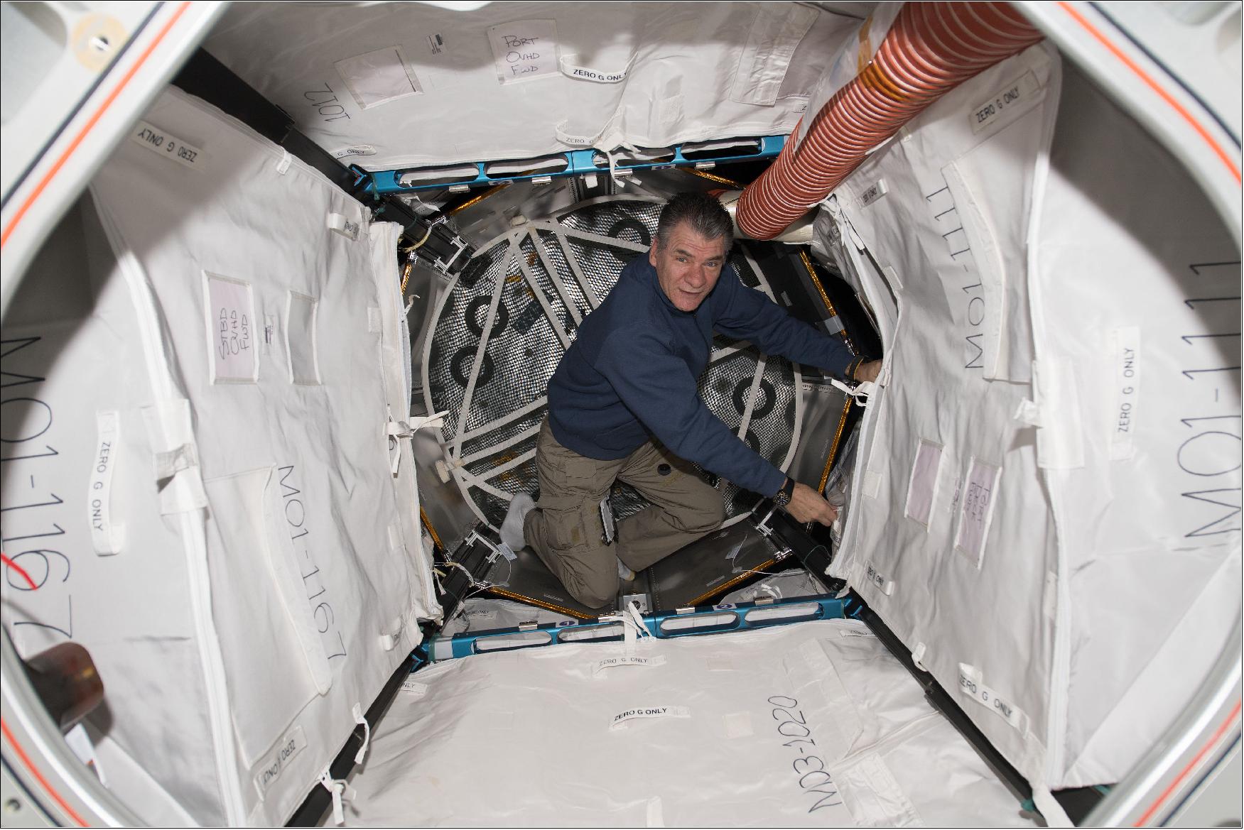 Figure 6: ESA astronaut Paolo Nespoli works inside the BEAM (Bigelow Expandable Activity Module) outfitting it for future cargo storage aboard the International Space Station (image credit: NASA, ESA)
