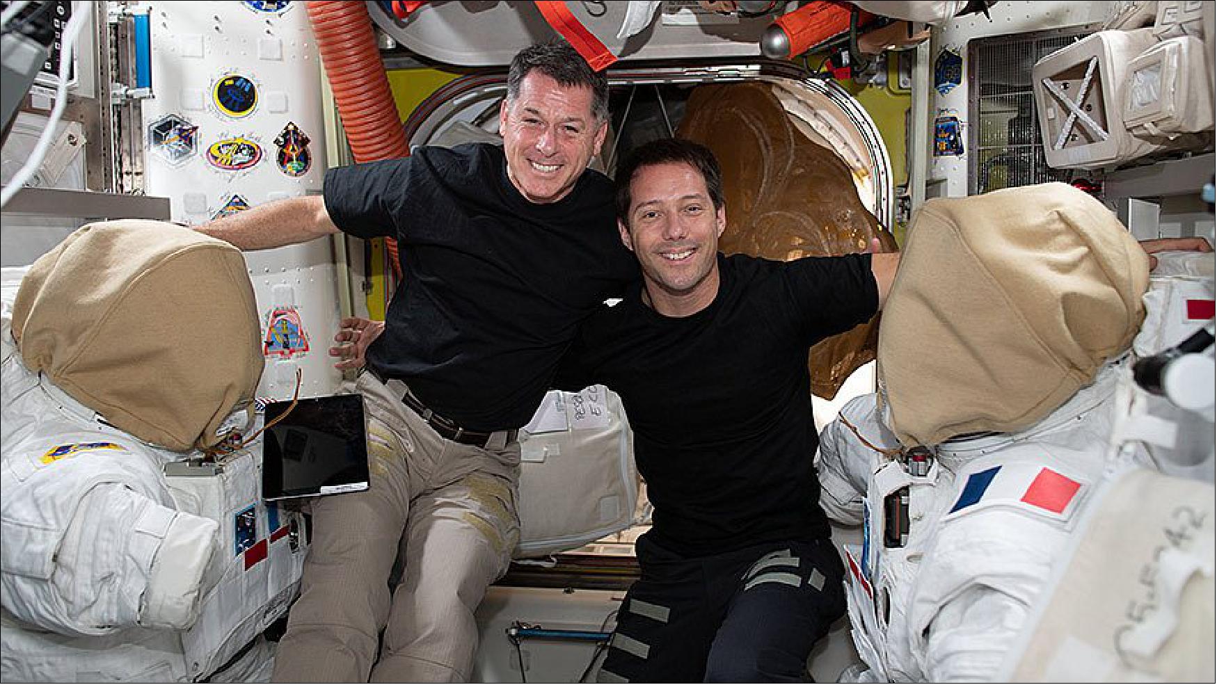 Figure 12: Astronauts Shane Kimbrough (from left) and Thomas Pesquet pose for a portrait while working on U.S. spacesuits (image credit: NASA)