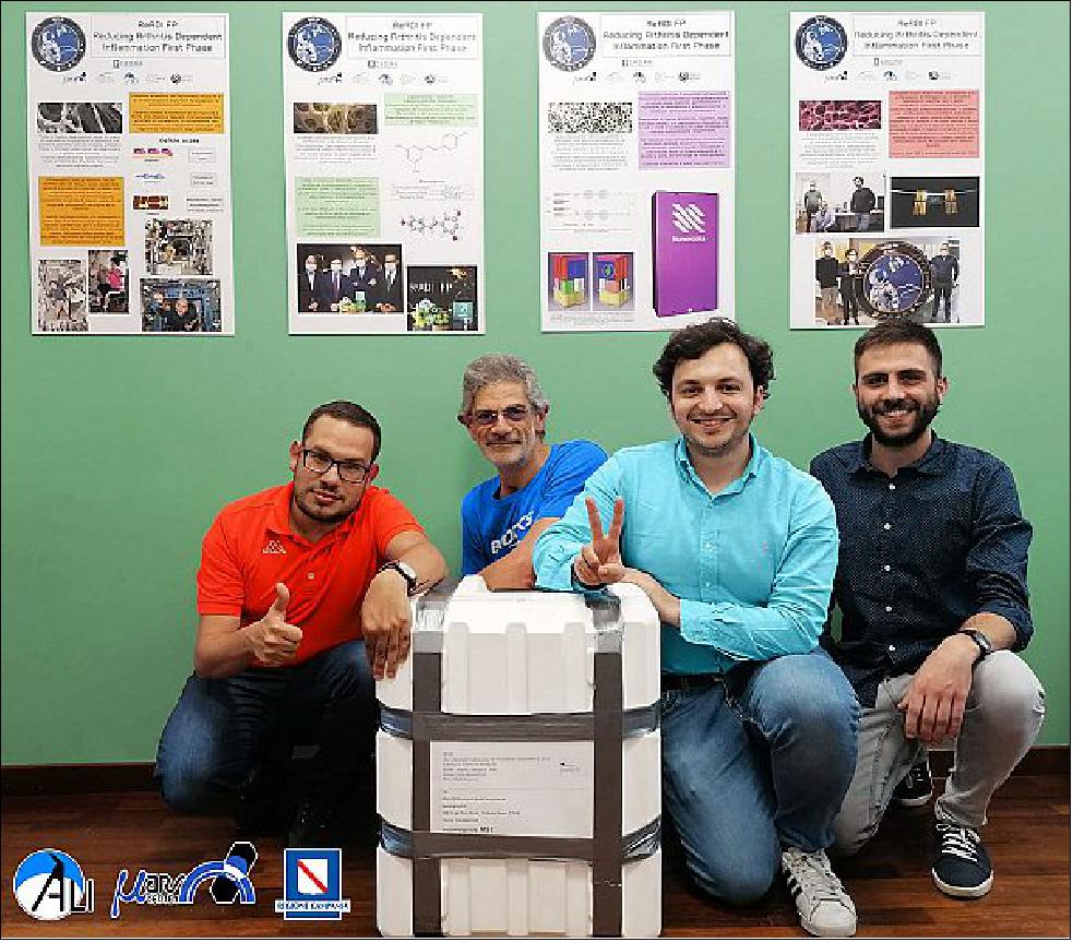Figure 4: Shown with their experiment packed for launch, READI FP team members from left to right, Michele Cioffi, program manager; Fabio Peluso, honorary member of MARSCenter scientific committee; Marco Fabio Miceli, system and test engineer; and Pasquale Pellegrino, test engineer from Aerospace Laboratory for Innovative components (ALI) S.C. a r.l. in Italy (image credits: ALI scarl/Marcenter)