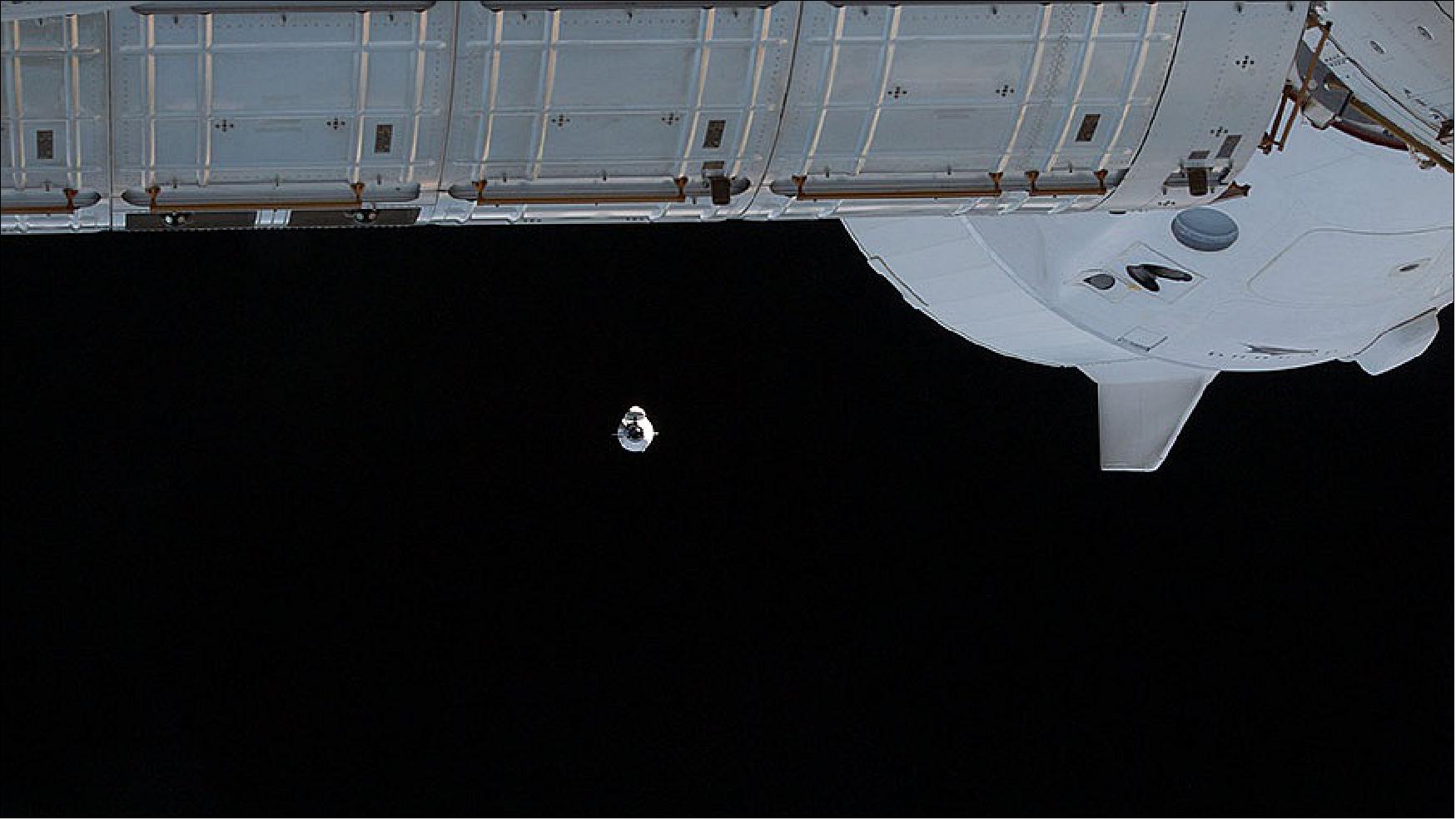 Figure 24: The SpaceX Cargo Dragon approaches the station on Dec. 22. The SpaceX Crew Dragon Endeavour can be seen docked to the Harmony module’s forward port (image credit: NASA TV)
