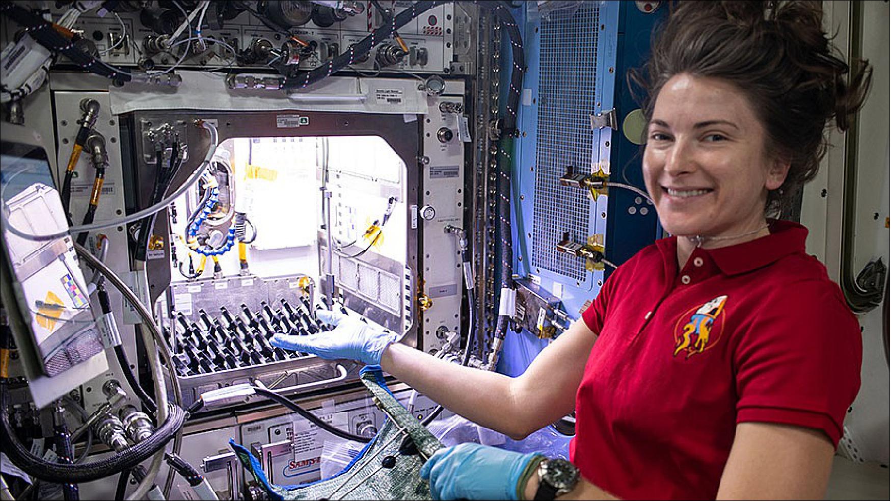 Figure 23: NASA astronaut Kayla Barron sets up the Plant Habitat-05 Growth experiment that is studying cotton genetics in microgravity (image credit: NASA TV)