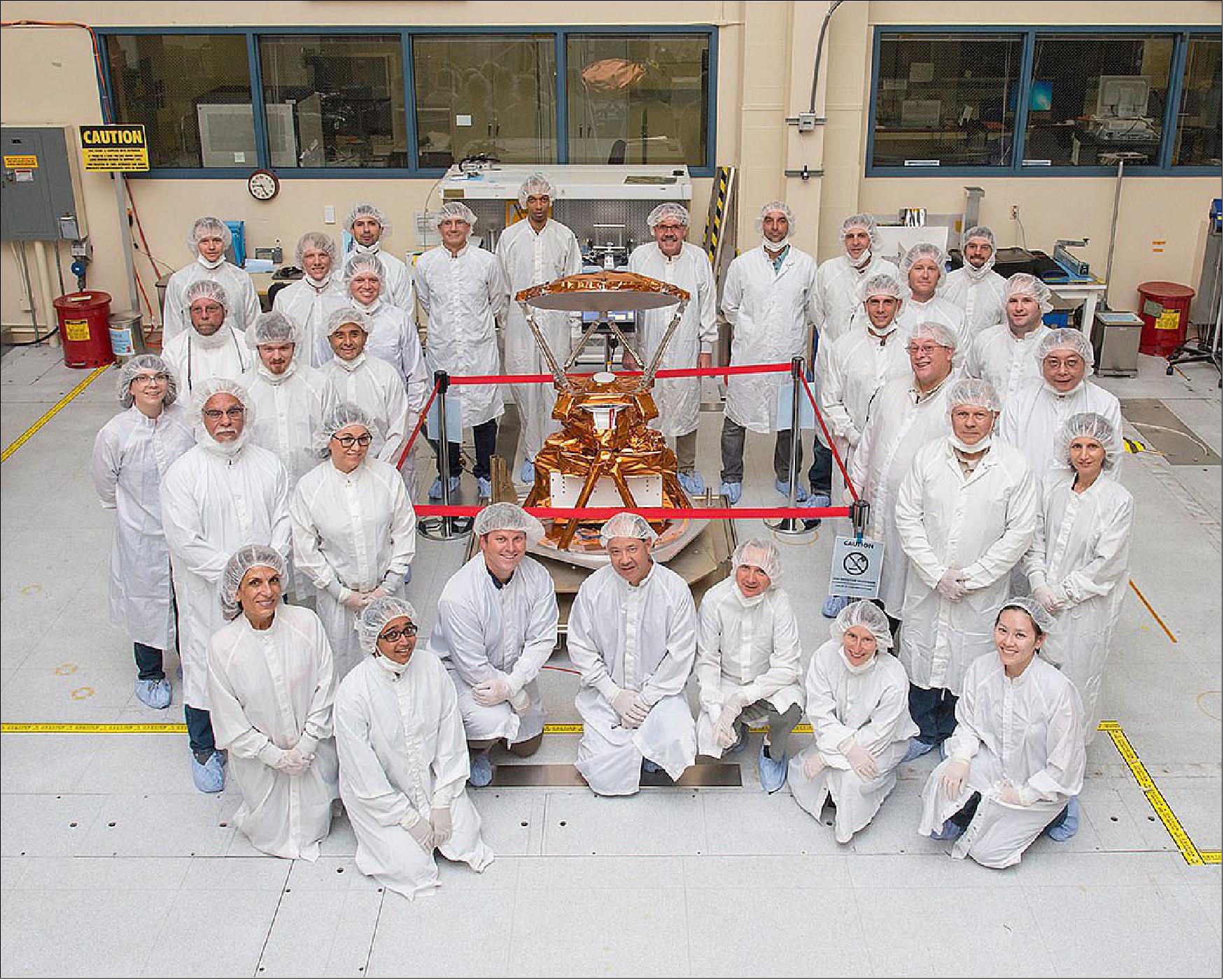 Figure 10: The COWVR development team and instrument in a clean room at JPL (image credits: NASA/JPL-Caltech)