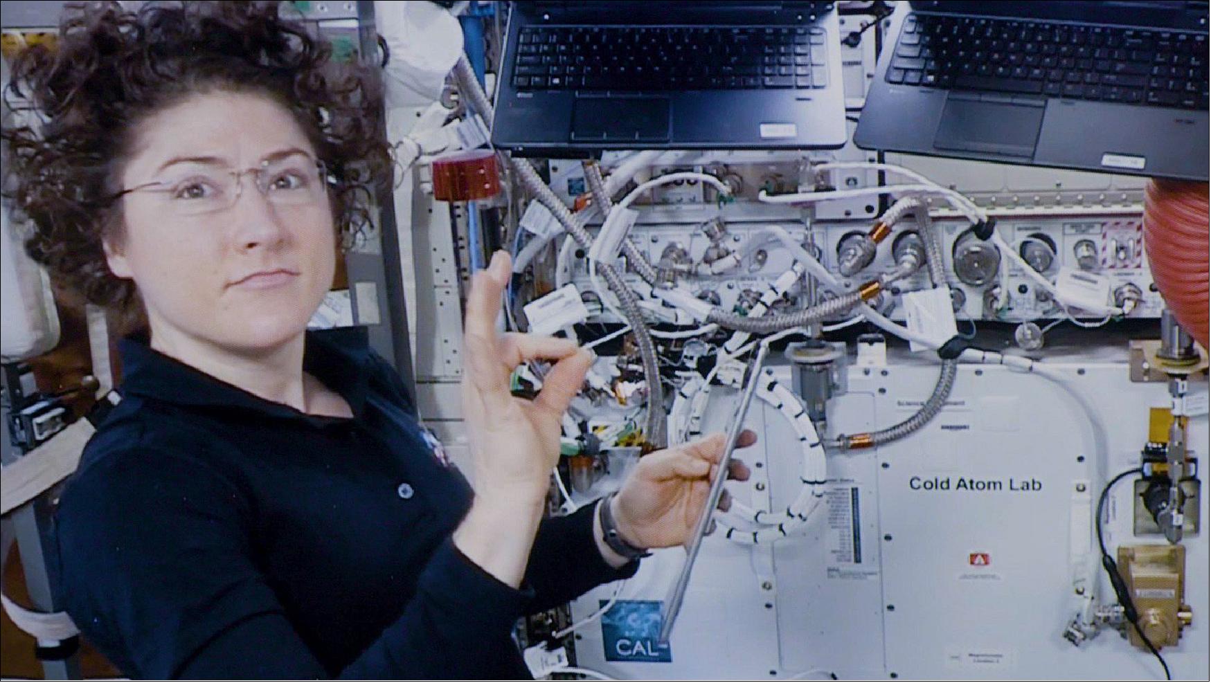 Figure 22: Astronaut Christina Koch assists with a hardware upgrade for NASA's Cold Atom Lab aboard the International Space Station in January 2020 (image credit: NASA-International Space Station)
