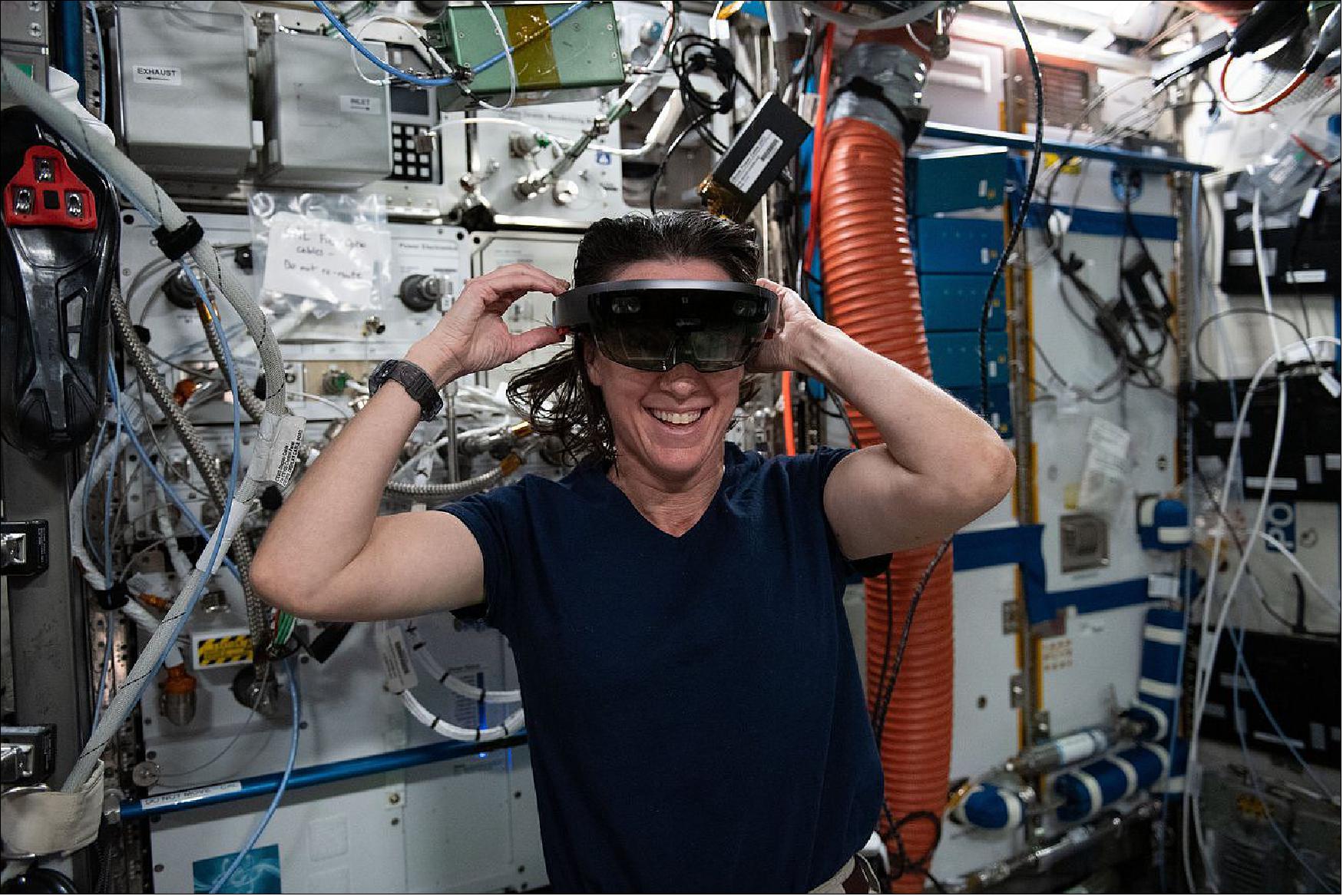 Figure 18: NASA Astronaut Megan McArthur dons a Microsoft HoloLens, a mixed reality (or augmented reality) headset, which allows her to see both the space around her as well as digital displays in her field of view (image credit: NASA)