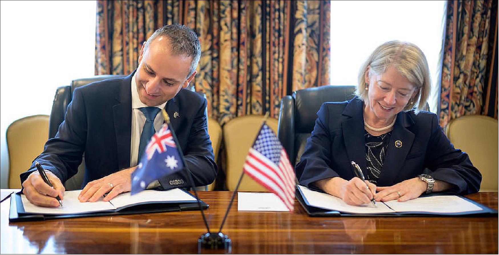 Figure 4: Australian Space Agency Head Enrico Palermo, left, and NASA Deputy Administrator Pam Melroy, sign a joint statement of intent for cooperation in Earth science during the 37th Space Symposium, Monday, April 4, 2022, in Colorado Springs, Colorado (photo credit: NASA, Bill Ingalls)