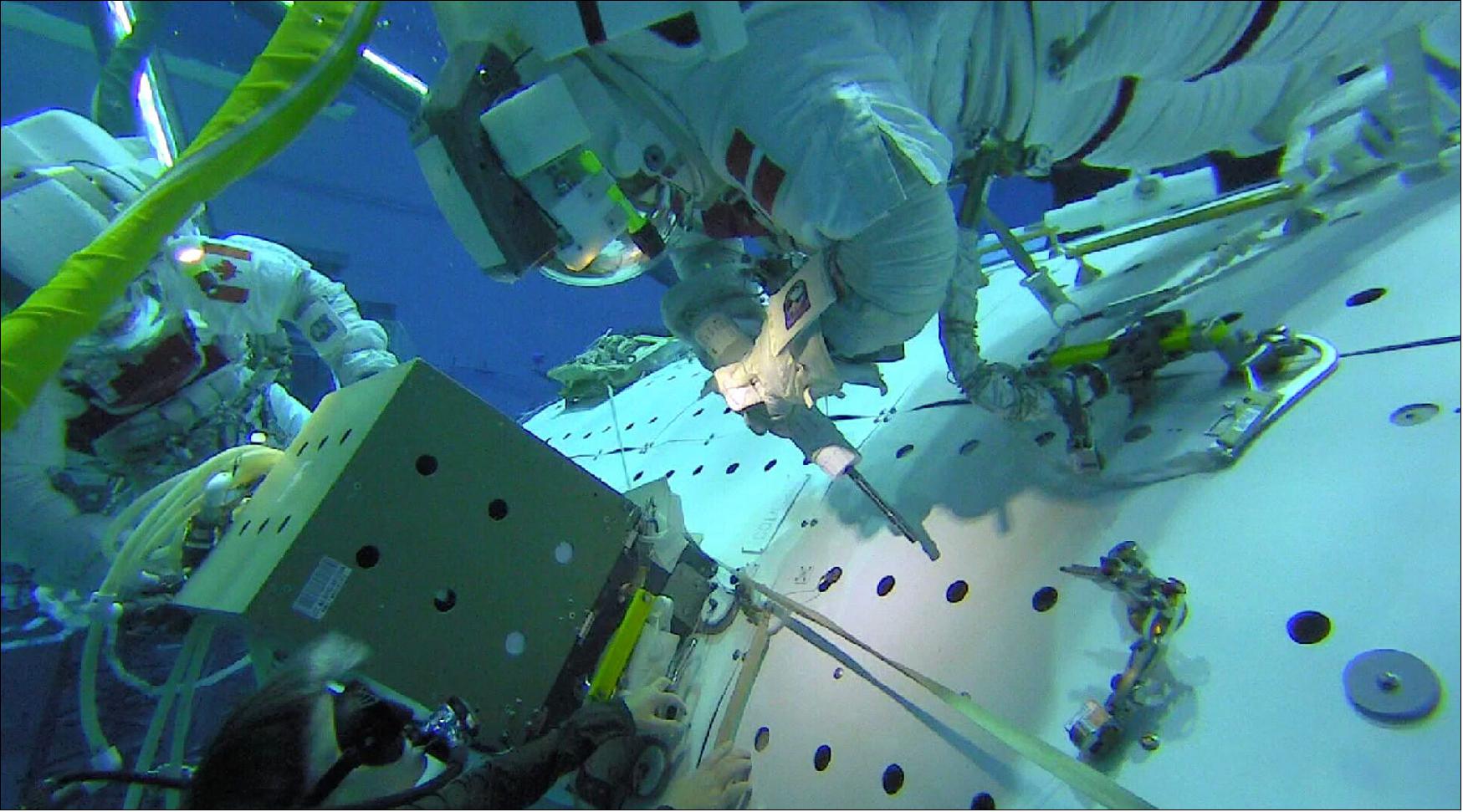 Figure 11: ESA astronaut Andreas Mogensen is seen in this image installing the Columbus Ka-band or ColKa terminal that will enable faster communication with Europe during a ‘dress rehearsal’ in the Neutral Buoyancy Lab at NASA’s Johnson Space Center in Houston, Texas in 2018 (image credit: NASA EVA NBL)
