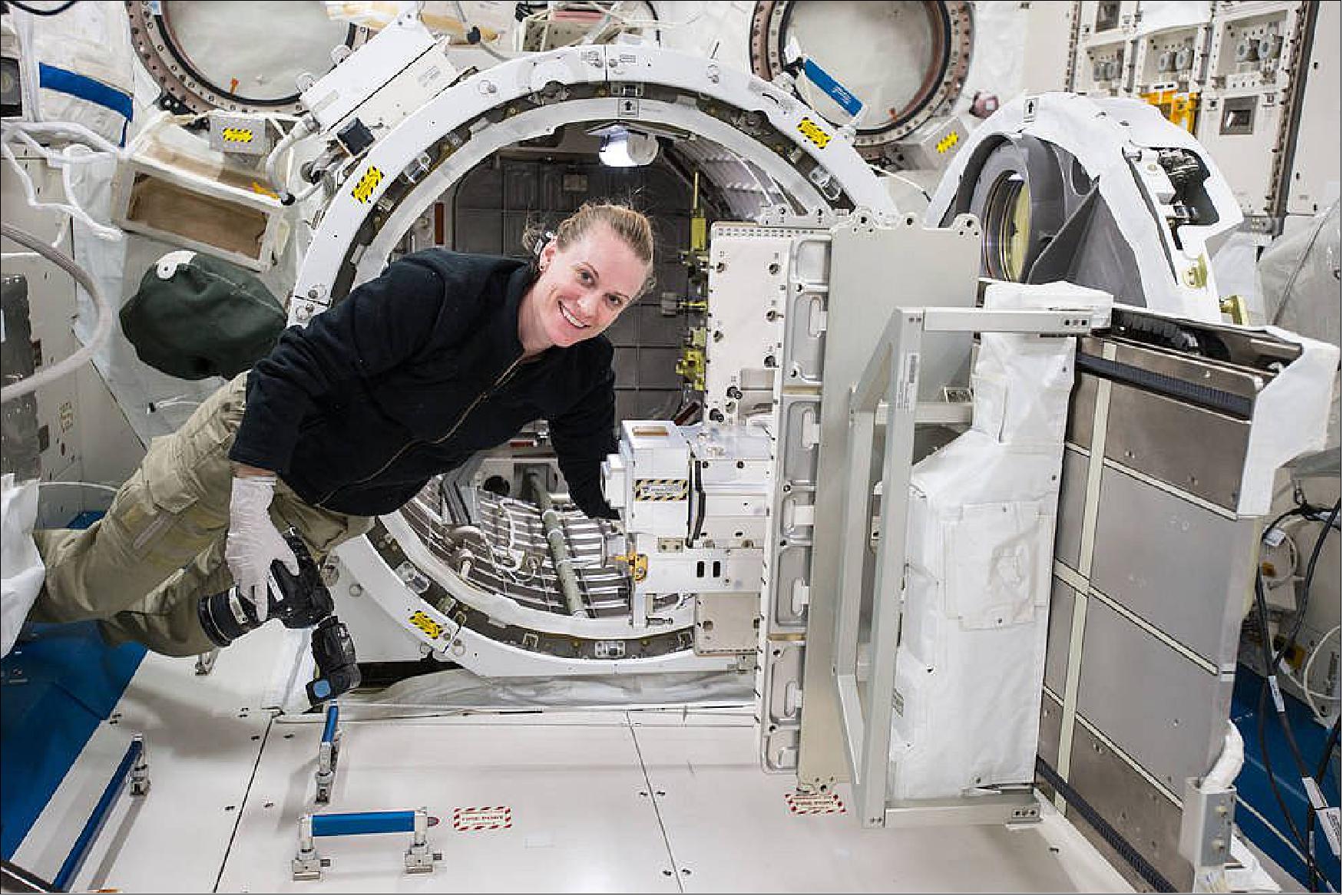 Figure 9: Astronaut Kate Rubins loading the Robotic External Leak Locator for deployment into space (image credit: NASA)