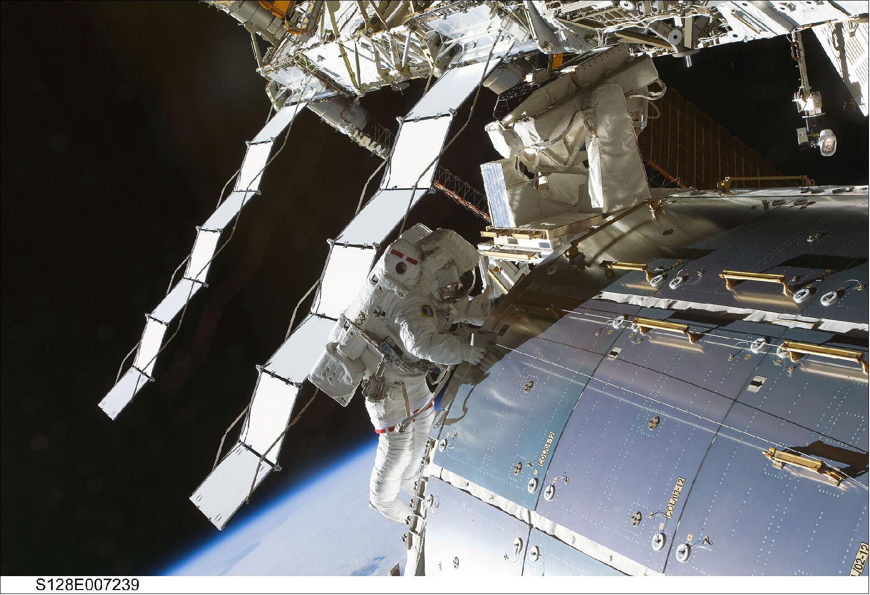 Figure 2: In May 2013, ammonia radiators were installed on Station. NASA Astronaut Nicole Stott, Expedition 20 flight engineer, during a six-hour spacewalk. Nicole and NASA astronaut John Olivas removed an empty ammonia tank from the Station and retrieved the European Technology Exposure Facility and Materials International Space Station Experiment from outside ESA’s Columbus laboratory module and installed them in Space Shuttle Discovery for return to Earth. - The white ammonia-cooled radiators can be seen in the background (image credit: ESA, CC BY-SA 3.0 IGO) 2)