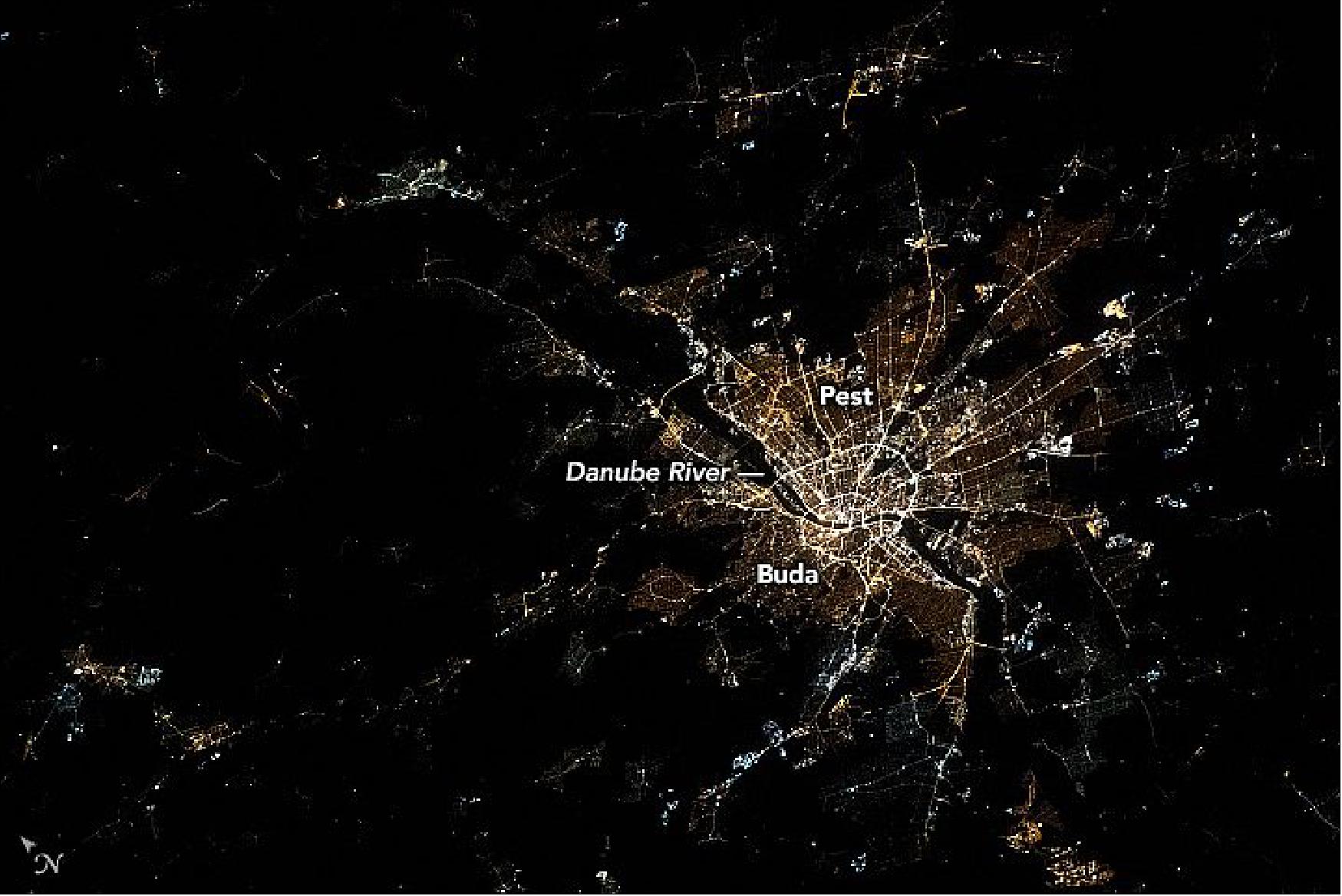 Figure 70: Budapest at night. The astronaut photograph ISS062-E-102615 was acquired on March 18, 2020, with a Nikon D5 digital camera using a 200 mm lens and is provided by the ISS Crew Earth Observations Facility and the Earth Science and Remote Sensing Unit, Johnson Space Center. The image was taken by a member of the Expedition 62 crew (image credit: NASA Earth Observatory, caption by Laura Phoebus)