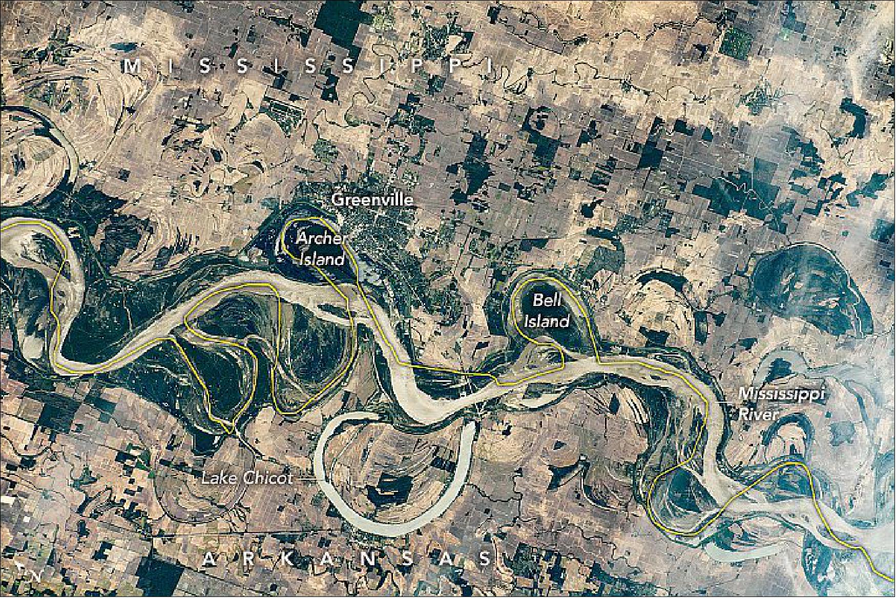 Figure 55: The wandering river is a boon to farming, but it has no interest in state borders. This astronaut photograph ISS062-E-121160 was acquired on April 2, 2020, with a Nikon D5 digital camera using a 240 mm lens and is provided by the ISS Crew Earth Observations Facility and the Earth Science and Remote Sensing Unit, Johnson Space Center. The image was taken by a member of the Expedition 62 crew. Note that north is to the left in this image (image credit: NASA Earth Observatory, caption by Sara Schmidt)