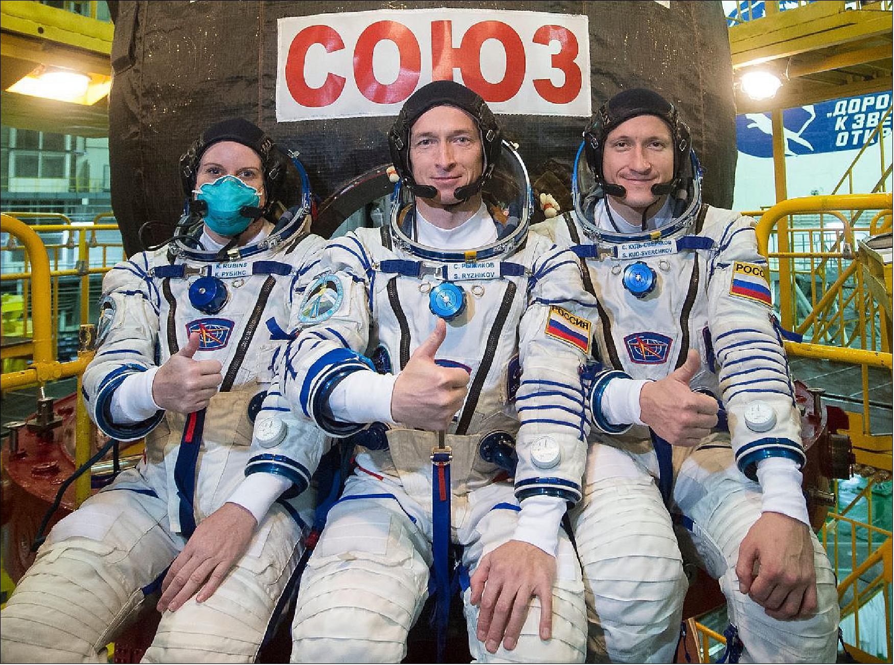 Figure 34: Expedition 64 crew members (from left) Kate Rubins of NASA and Sergey Ryzhikov and Sergey Kud-Sverchkov of Roscosmos in front of the Soyuz MS-17 spacecraft (image credit: image credit: Roscosmos)