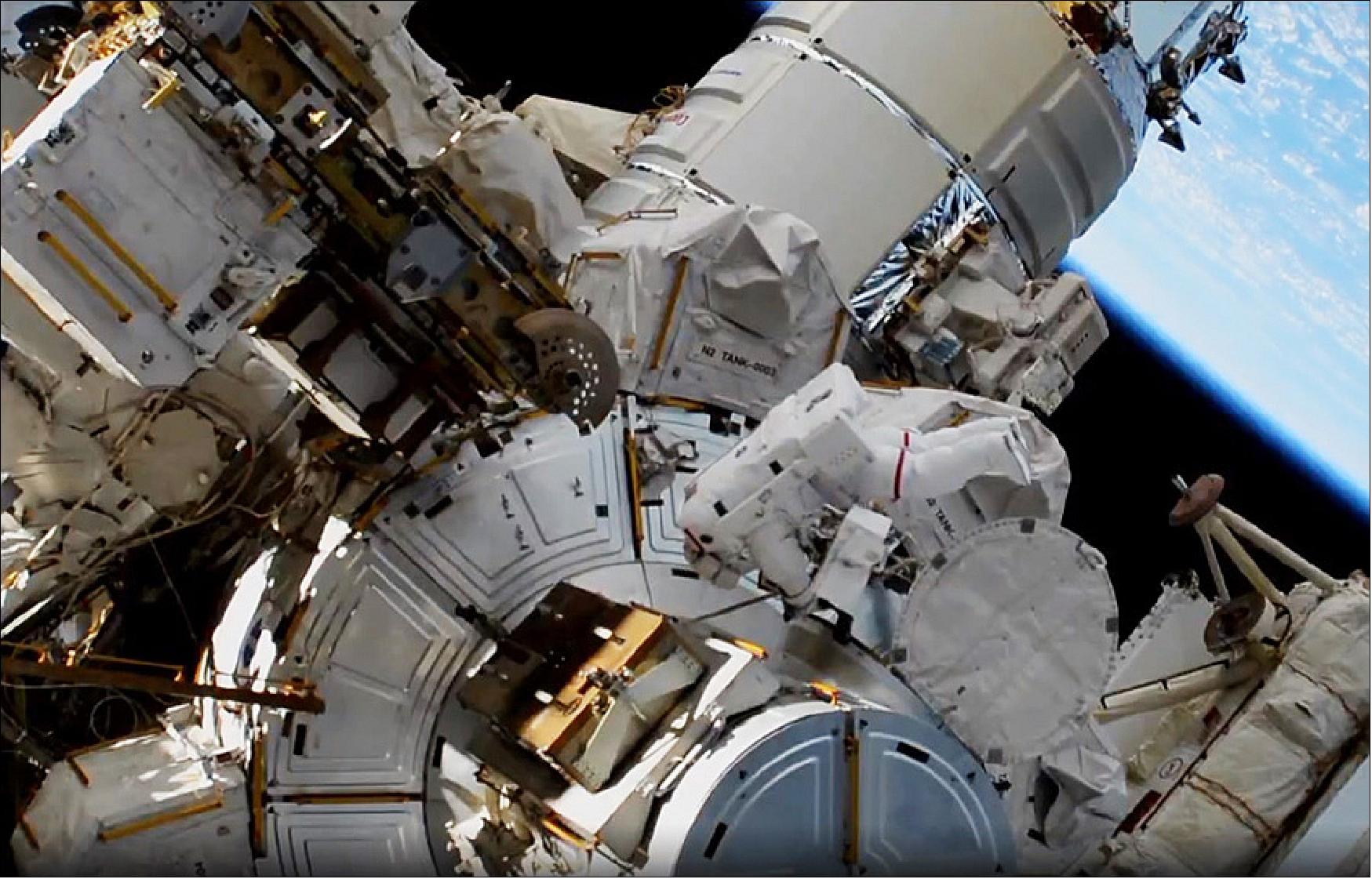 Figure 122: NASA astronaut Jessica Meir enters the Quest airlock to complete a spacewalk after swapping batteries on the International Space Station that store and distribute solar power collected for the solar arrays (image credit: NASA)