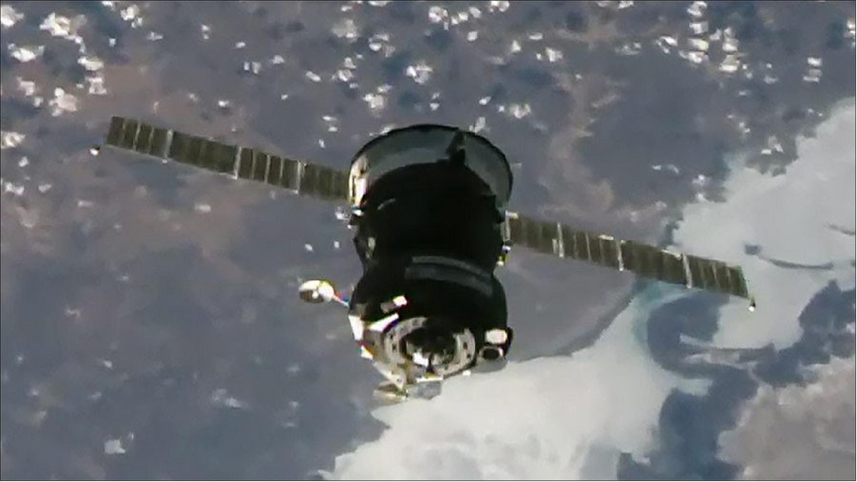 Figure 102: The Soyuz MS-18 crew ship is pictured on final approach to its docking port on the space station's Rassvet module (image credit: NASA TV) 89)