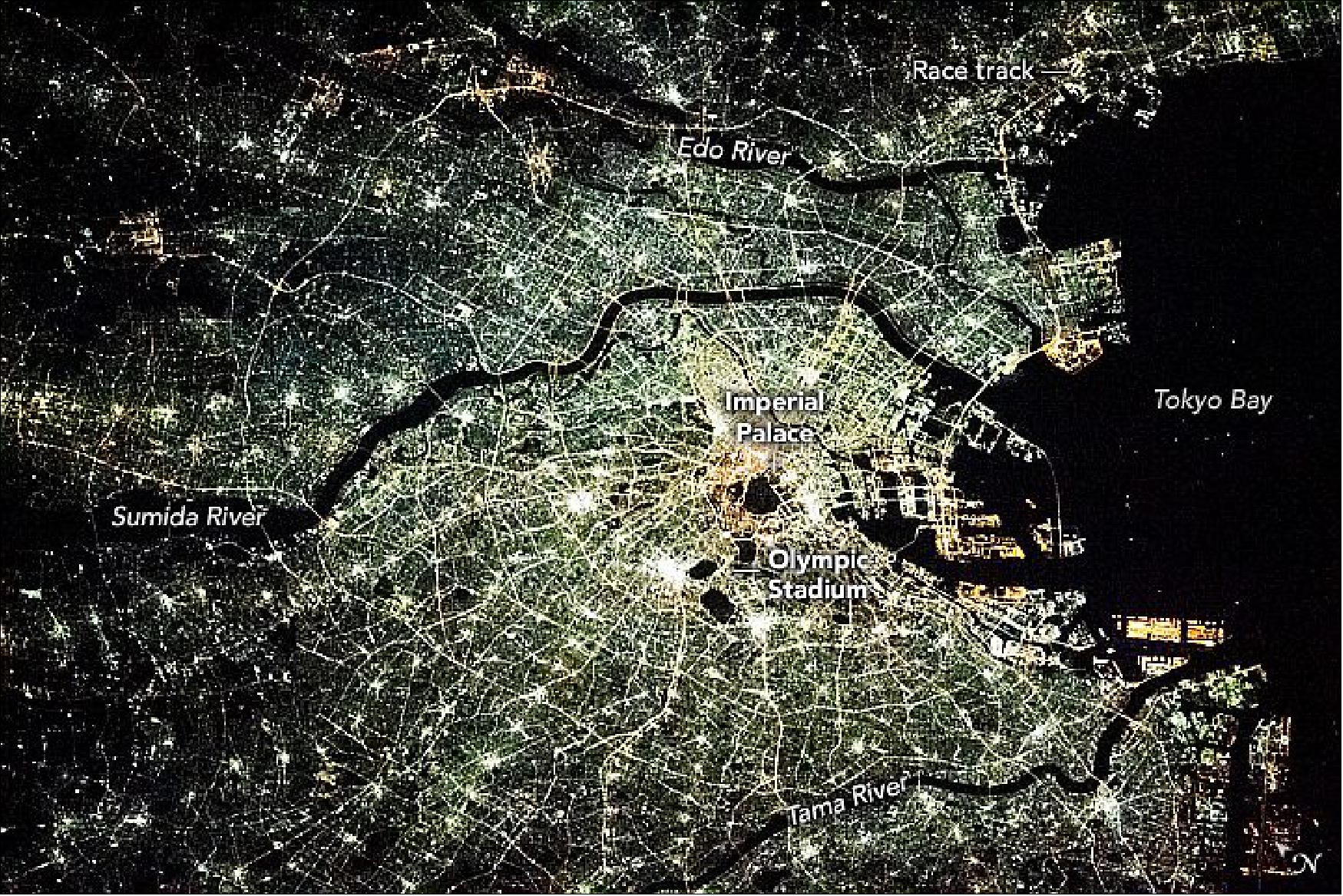 Figure 45: Strings of light emanate from the Imperial Palace in the city's center and follow the expressway system outward. The astronaut photograph ISS064-E-15098 was acquired on December 23, 2020, with a Nikon D5 digital camera using a 400 mm focal length and is provided by the ISS Crew Earth Observations Facility and the Earth Science and Remote Sensing Unit, Johnson Space Center. The image was taken by a member of the Expedition 64 crew. The image has been cropped and enhanced to improve contrast, and lens artifacts have been removed (image credit: NASA Earth Observatory, Caption by Alex Stoken)