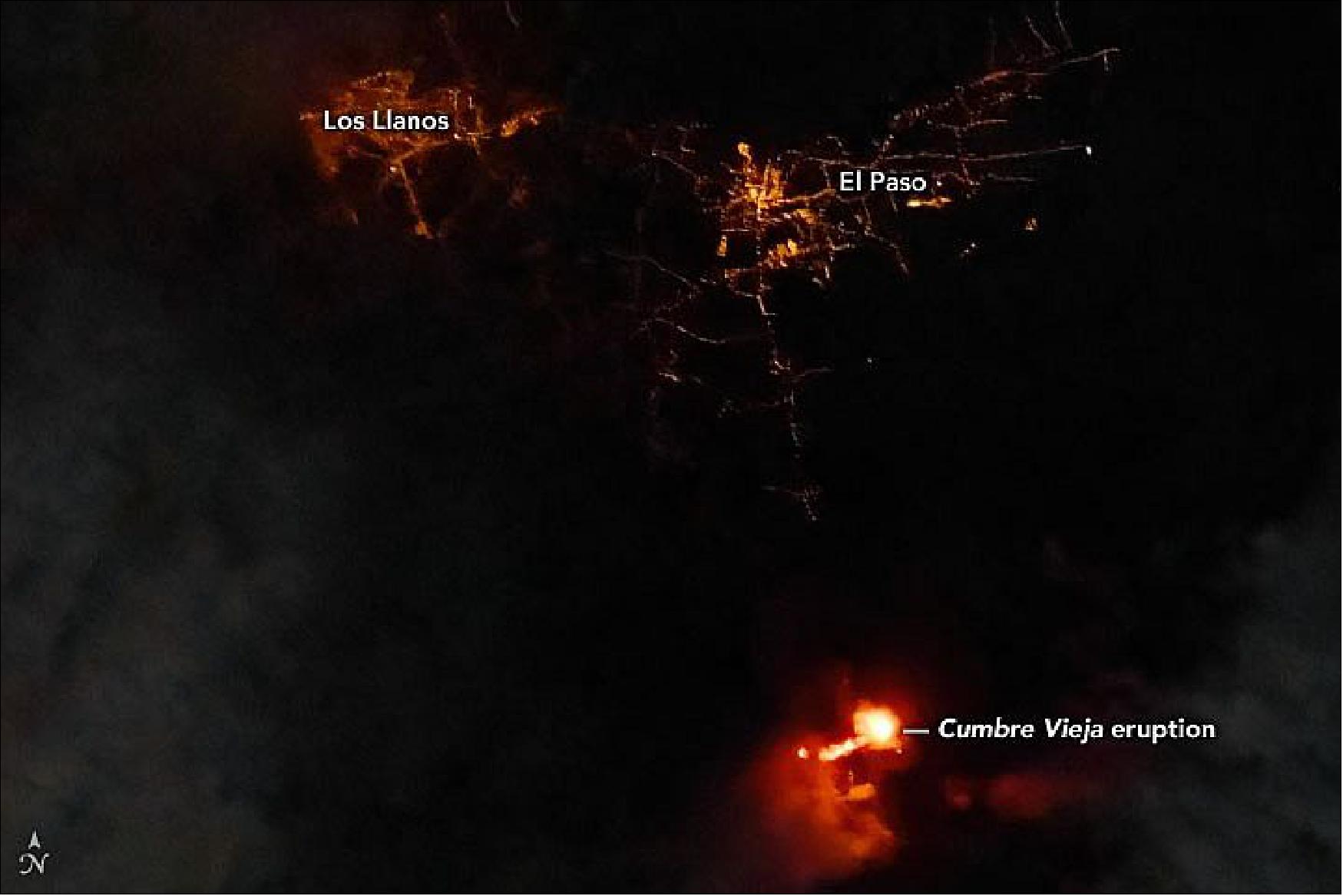 Figure 34: An astronaut photograph shows the proximity of a volcanic eruption to nearby cities on the Spanish island of La Palma. The photograph was taken by a member of the Expedition 65 crew. The image has been cropped and enhanced to improve contrast, and lens artifacts have been removed (image credit: NASA Earth Observatory, Story by Kathryn Hansen)