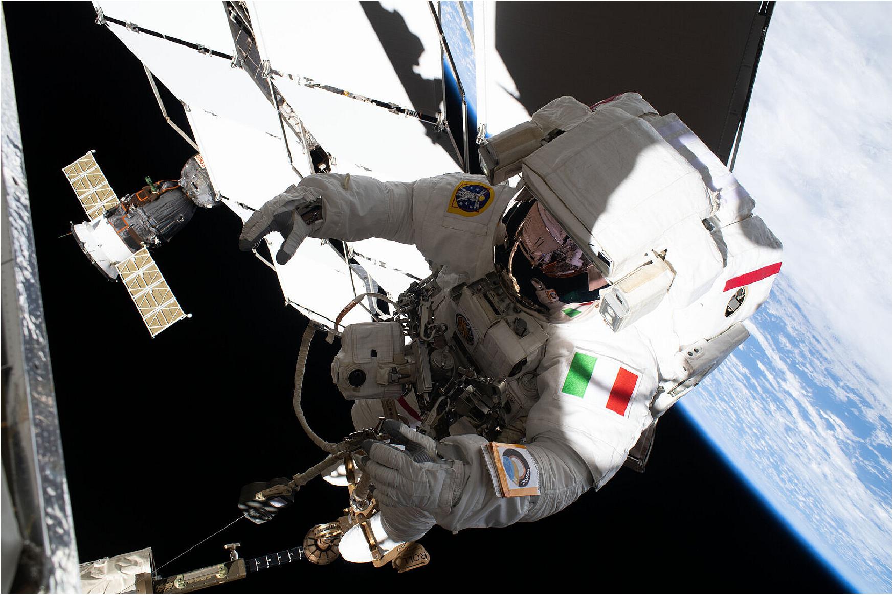Figure 6: Riding on the International Space Station’s robotic arm, Luca soared to the cosmic ray detector’s worksite for nearly five hours of space plumbing (image credit: NASA)