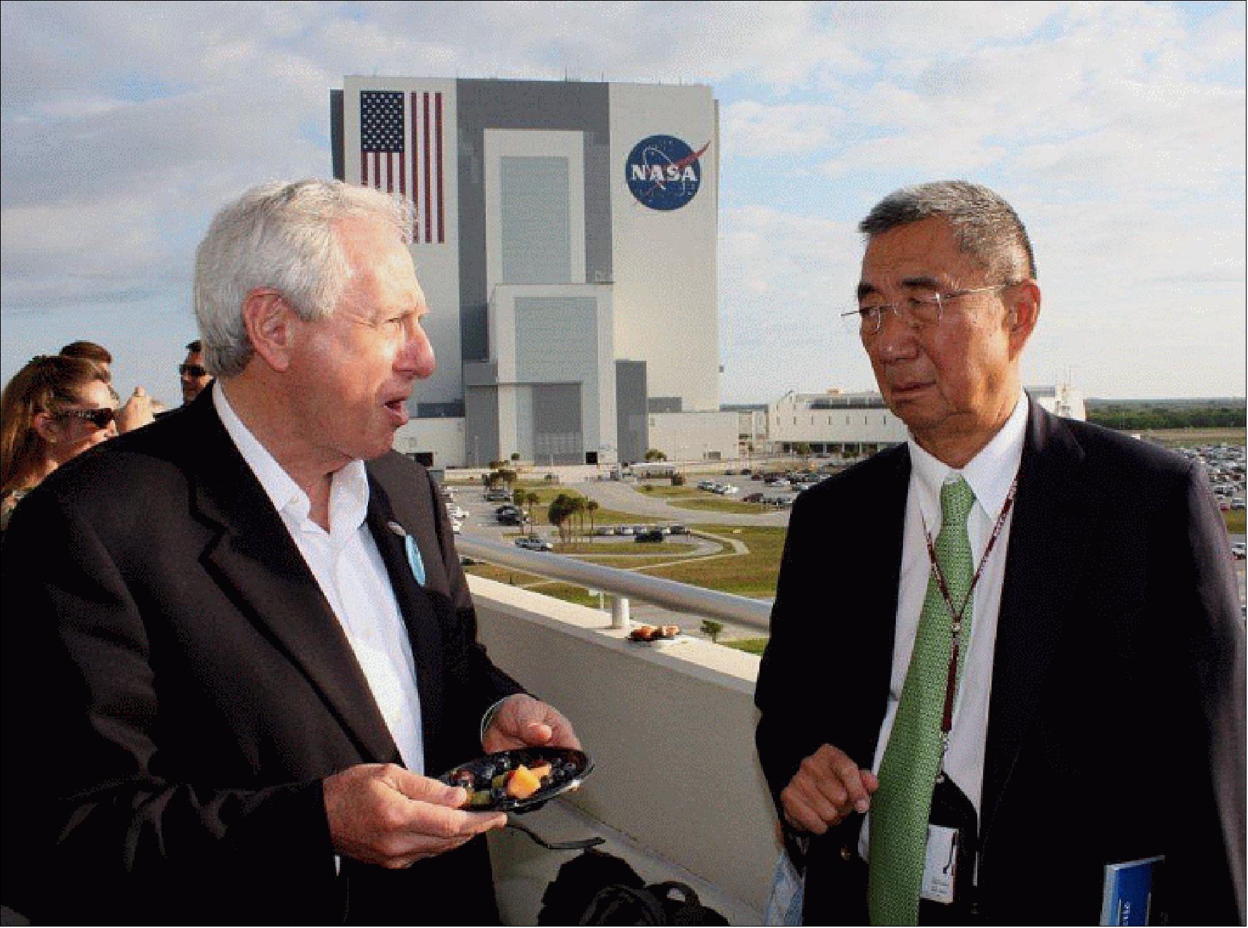 Figure 3: Daniel Goldin, former NASA Administrator realized the unique potential of ISS for fundamental science and has supported AMS from the beginning. The image shows Daniel Goldin (left) and Samuel Ting of MIT on May 16, 2011 when AMS-02 was launched on the Space Shuttle Endeavour (STS-134), image credit: S. Ting (Ref. 53)
