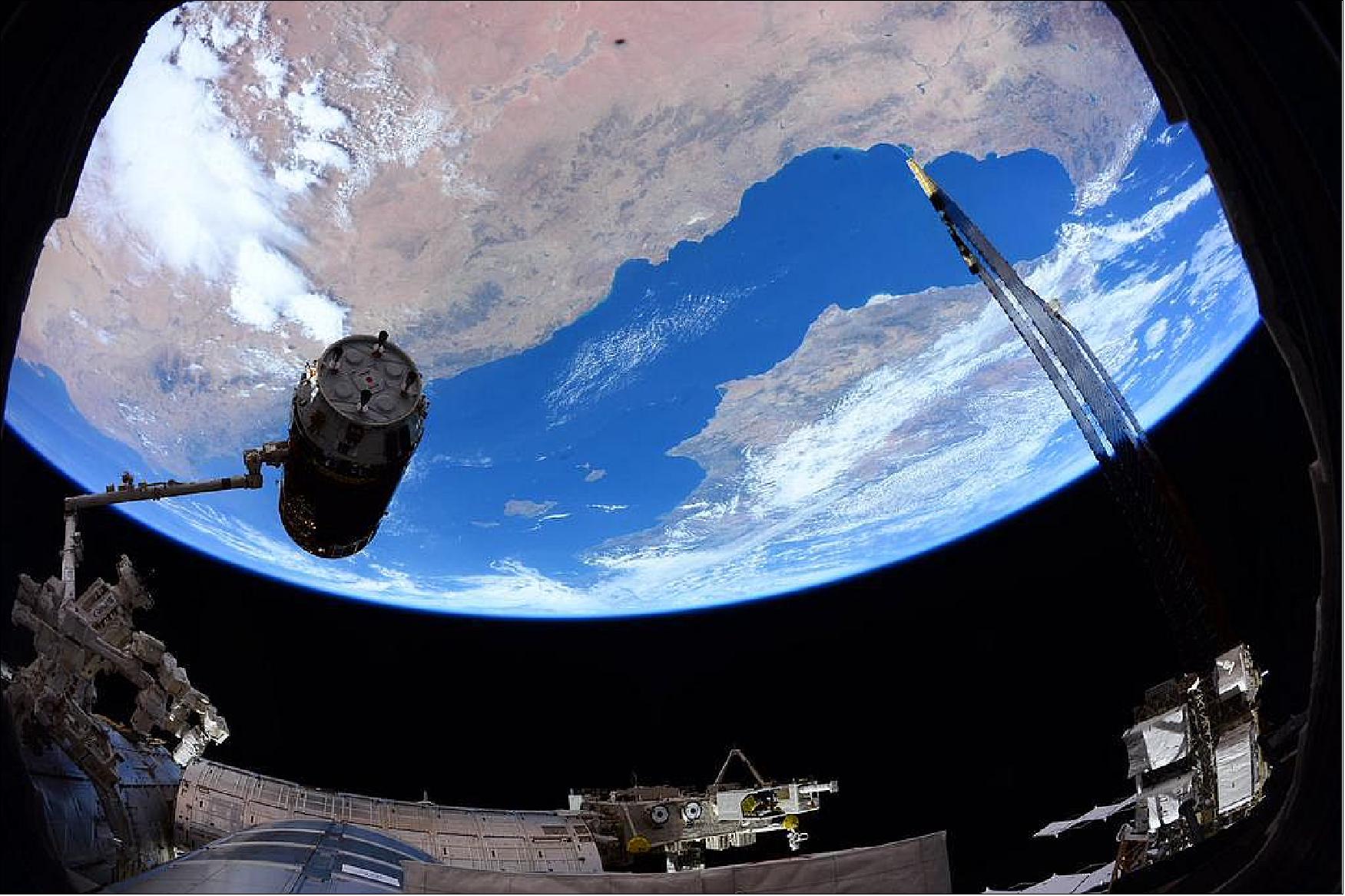 Figure 15: Photo of the HTV-5 supply ship arrival at the station and capture with Canadarm2 (image credit: NASA, John Kelly)