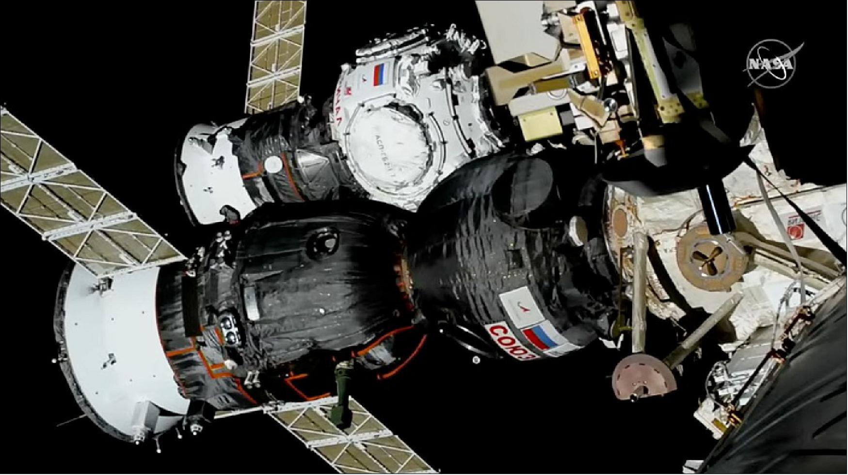 Figure 10: Roscosmos attaches the new docking node Prichal (top vehicle in the image) to Russian Segment of the ISS (image credit: NASA TV)