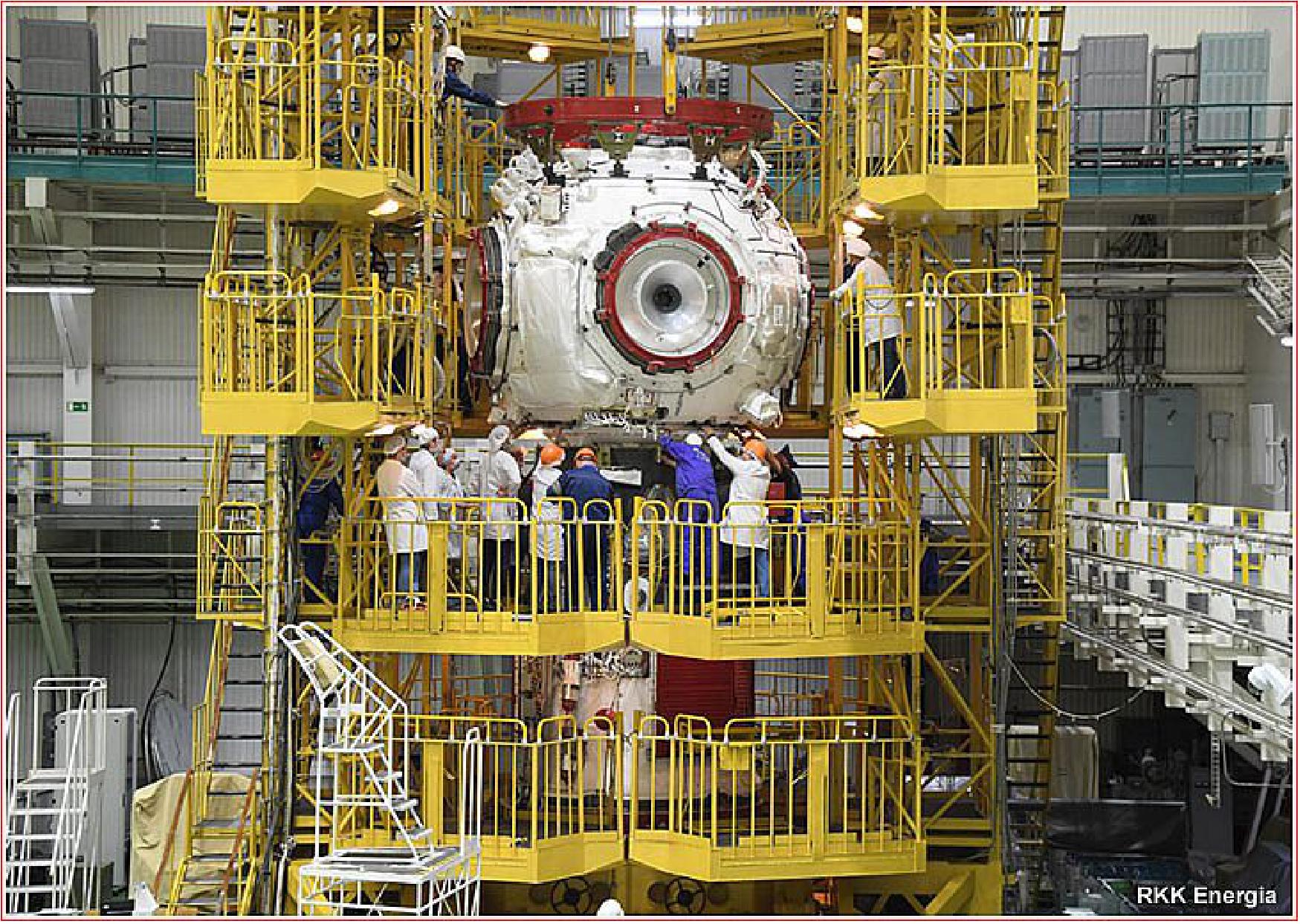 Figure 5: Prichal Node Module, UM, is being integrated with the Progress M-UM space tug on October 4, 2021 (image credit: RKK Energia, Anatoly Zak)