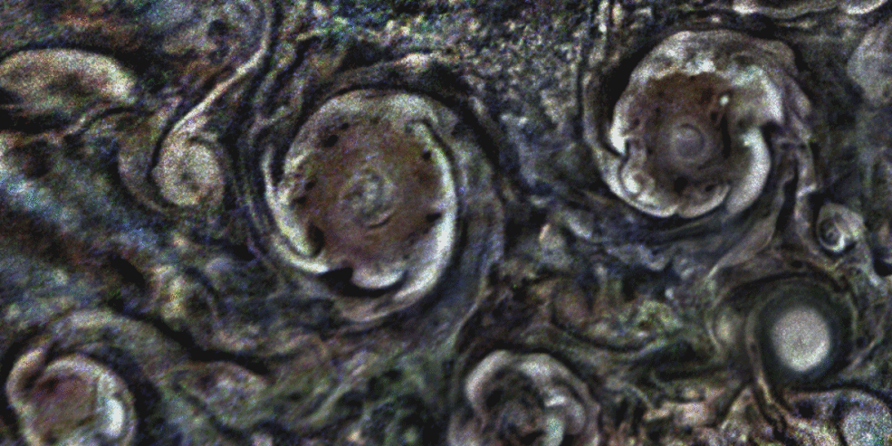 Figure 25: Mystery In this animated GIF, the clouds on the periphery of some of Jupiter's polar cyclones rotate counterclockwise, while the core of the cyclones rotate clockwise. The JunoCam images used for this animation were taken from altitudes of about 18,000 miles (28,567 kilometers) above Jupiter's cloud tops. Citizen scientist Gerald Eichstädt processed the images to enhance the color and contrast (credits: Image data: NASA/JPL-Caltech/SwRI/MSSS. Image processing: Gerald Eichstädt © CC BY)