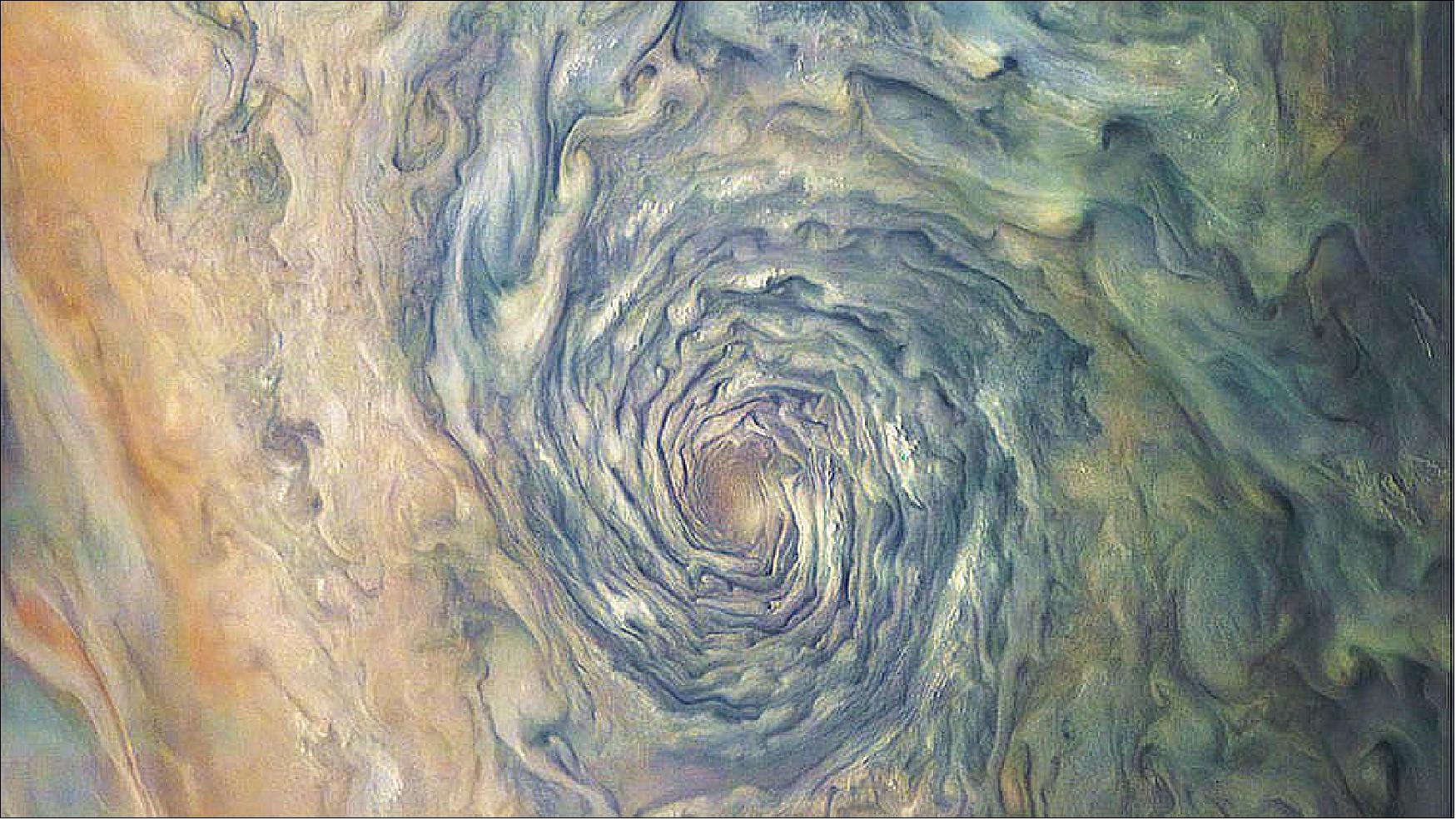 Figure 39: Soft pastels enhance the rich colors of the swirls and storms in Jupiter's clouds. This image of a vortex on Jupiter, taken by the Juno mission camera, JunoCam, captures the amazing internal structure of the giant storm (image credits: Image data: NASA/JPL-Caltech/SwRI/MSSS Image processing by Gerald Eichstädt/Seán Doran, © BY NC ND)