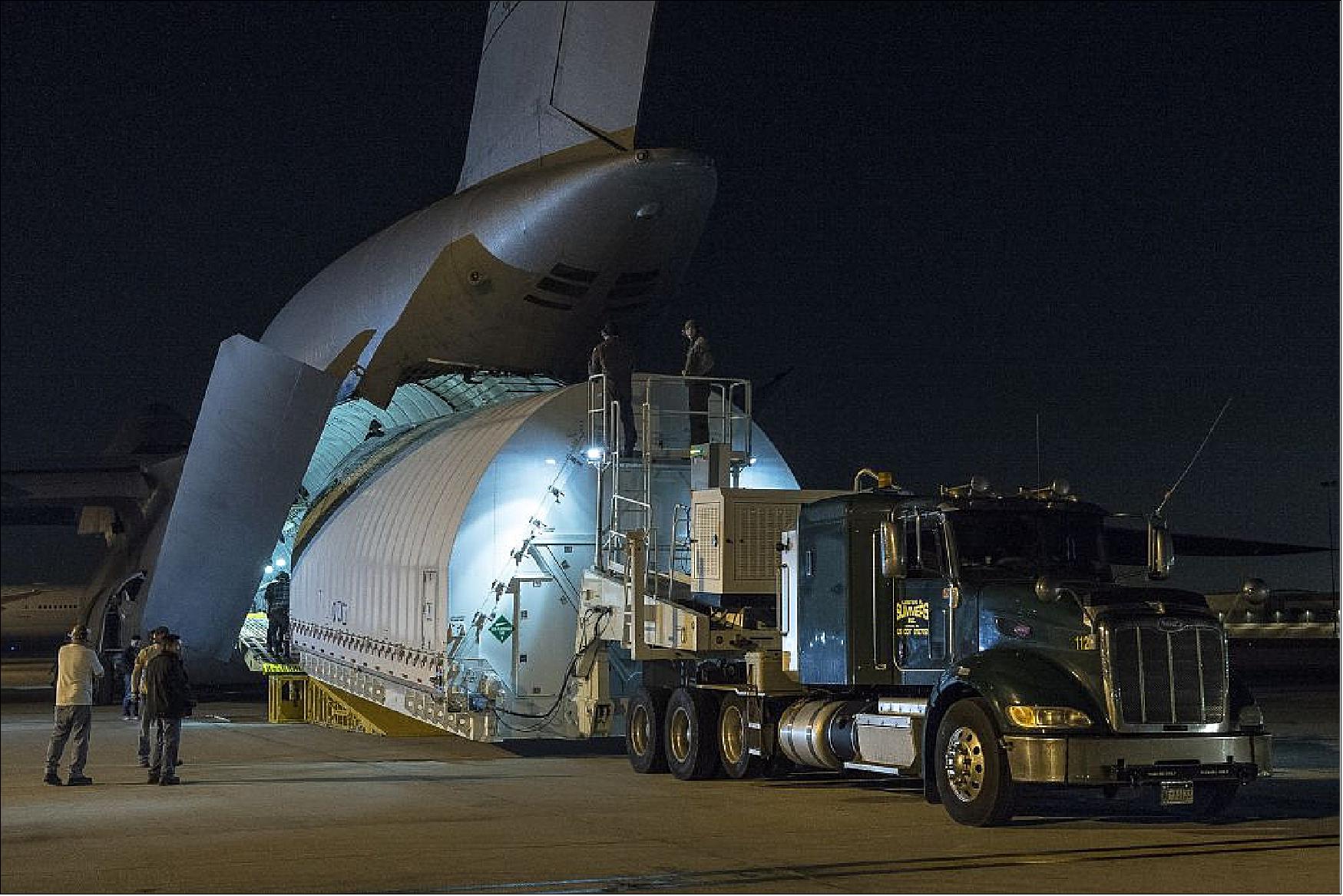 Figure 50: Photo of the STTARS (Space Telescope for Air, Road, and Sea) container with OTIS inside during unloading from the C-5 Charlie military aircraft at LAX (Los Angeles International Airport) on 2 Feb. 2018 (image credit: NASA, Chris Gunn)