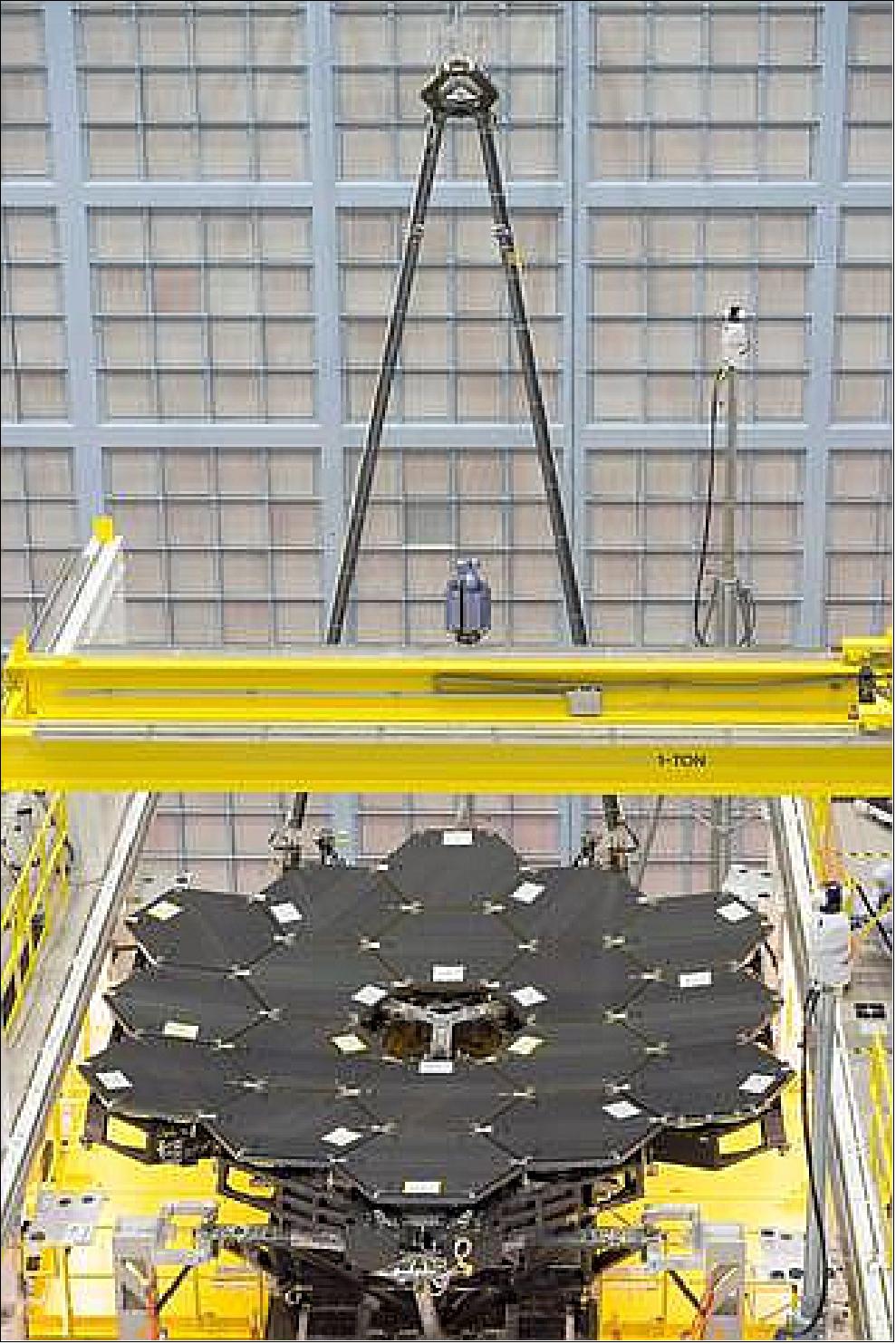 Figure 60: In this rare view, the JWST's 18 mirrors are seen fully installed on the JWST structure at NASA/GSFC in Greenbelt (image credit: NASA, Chris Gunn)