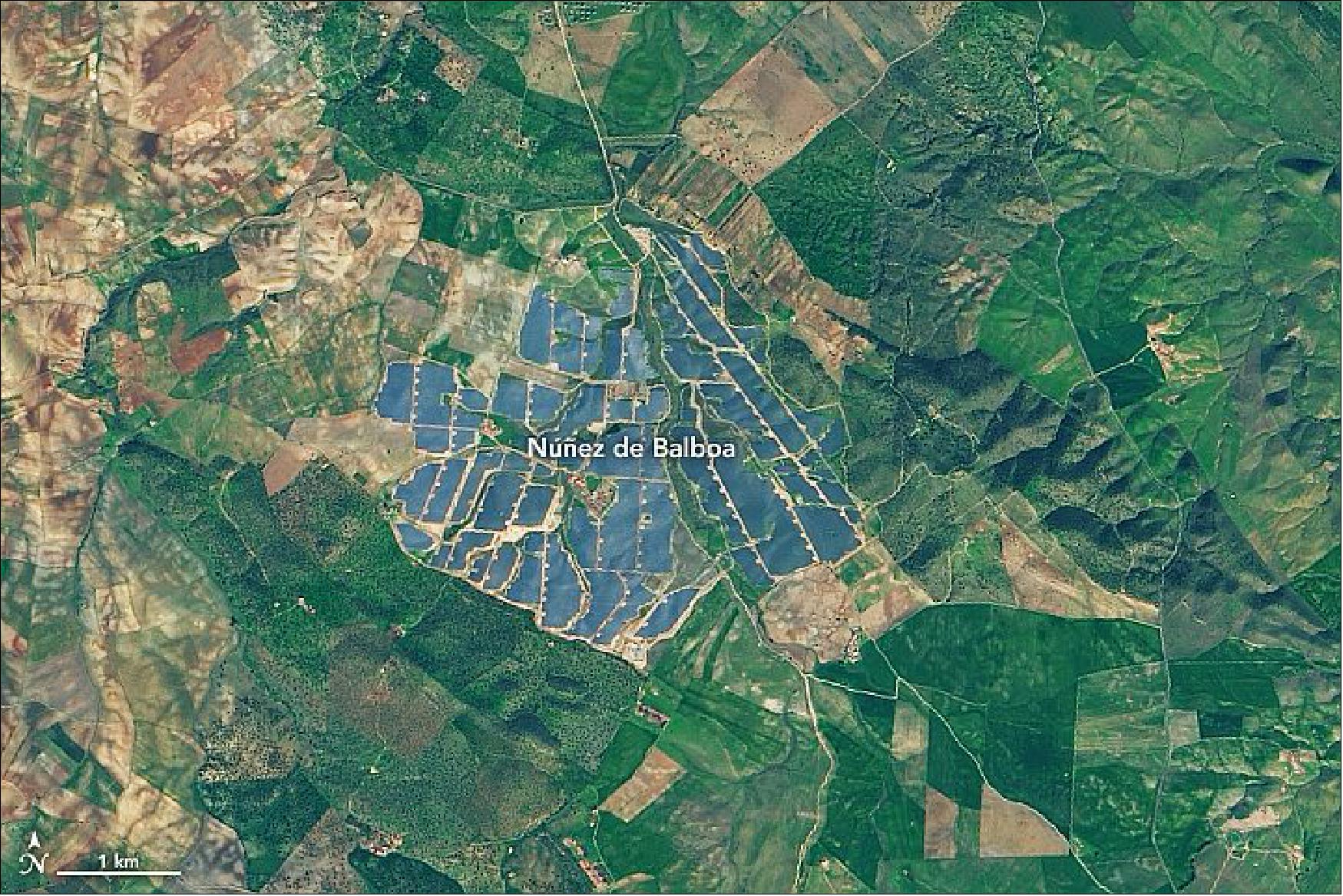Figure 113: This image shows the Núñez de Balboa photovoltaic plant, located in the town of Usagre in the western Spanish region of Extremadura. The image was acquired with OLI on Landsat-8 on 2 February 2020. The solar panels cover an area of nearly 10 km2 with a mass of than 12,000 tons (image credit: NASA Earth Observatory, image by Lauren Dauphin, using Landsat data from the U.S. Geological Survey. Story by Kasha Patel)