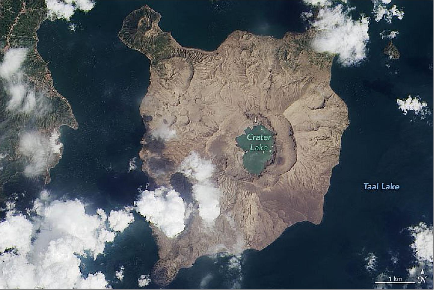 Figure 108: Two months later, the ash-damaged landscape still looks more like the Moon than the tropics. On March 11, 2020, the Operational Land Imager (OLI) on Landsat-8 acquired an image of Taal that underscores the consequences of the ashfall (image credit: NASA Earth Observatory)