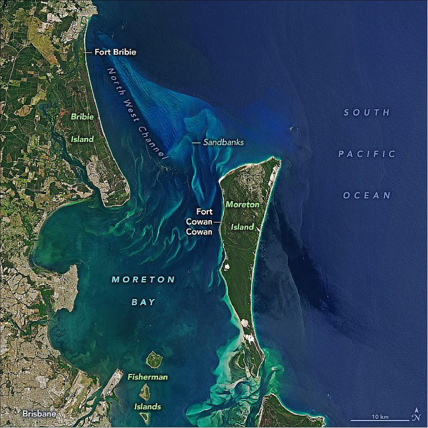 Figure 84: This natural-color image shows the northern entry into Moreton Bay as observed on November 6, 2019, by the Operational Land Imager (OLI) on Landsat-8. The bay spans about 1,500 km2 (600 square miles). During WWII, the North West Channel served as a main shipping passageway and was guarded by Fort Bribie and Fort Cowan (image credit: NASA Earth Observatory, image by Joshua Stevens, using Landsat data from the U.S. Geological Survey. Story by Kasha Patel)