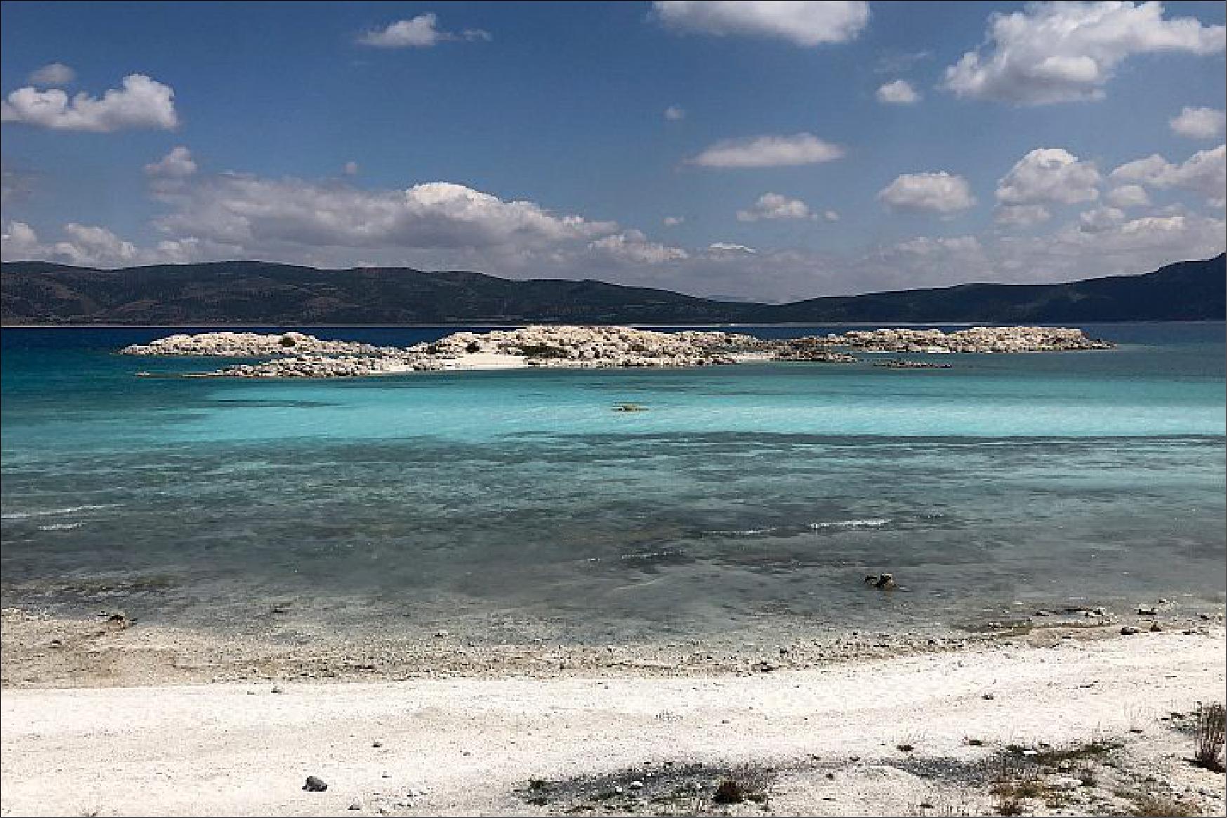 Figure 61: In August 2019, Garczynski took this photo of an exposed microbialite island on Lake Salda. Collaborating with colleagues at the Istanbul Technical University, the Purdue research team spent almost a week surveying the lake’s perimeter and surrounding area. Garczynski said these islands are expected to erode over time and will eventually be transported, reworked, and deposited as beach sediments along the shoreline (photo credit: Garczynski, B. J, et al. (2020))
