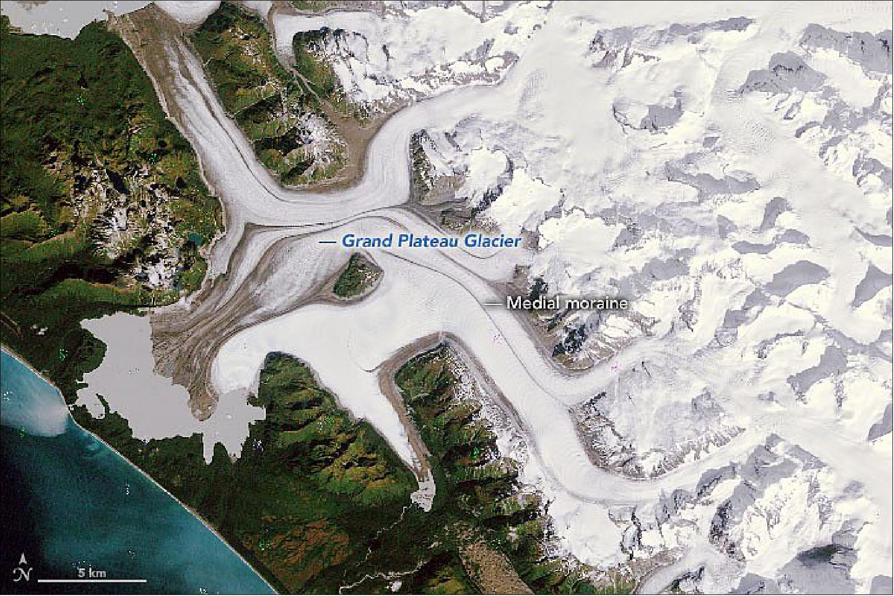 Figure 54: This image of the remote Grand Plateau Glacier, located about 50 km west of Glacier Bay across the Fairweather Range, was acquired on September 7, 1984, with Landsat-5 (image credit: NASA Earth Observatory, images by Joshua Stevens, using Landsat data from the U.S. Geological Survey, topographic data from the Shuttle Radar Topography Mission (SRTM), and land cover data from the Multi-Resolution Land Characteristics (MRLC) Consortium. Story by Kathryn Hansen)
