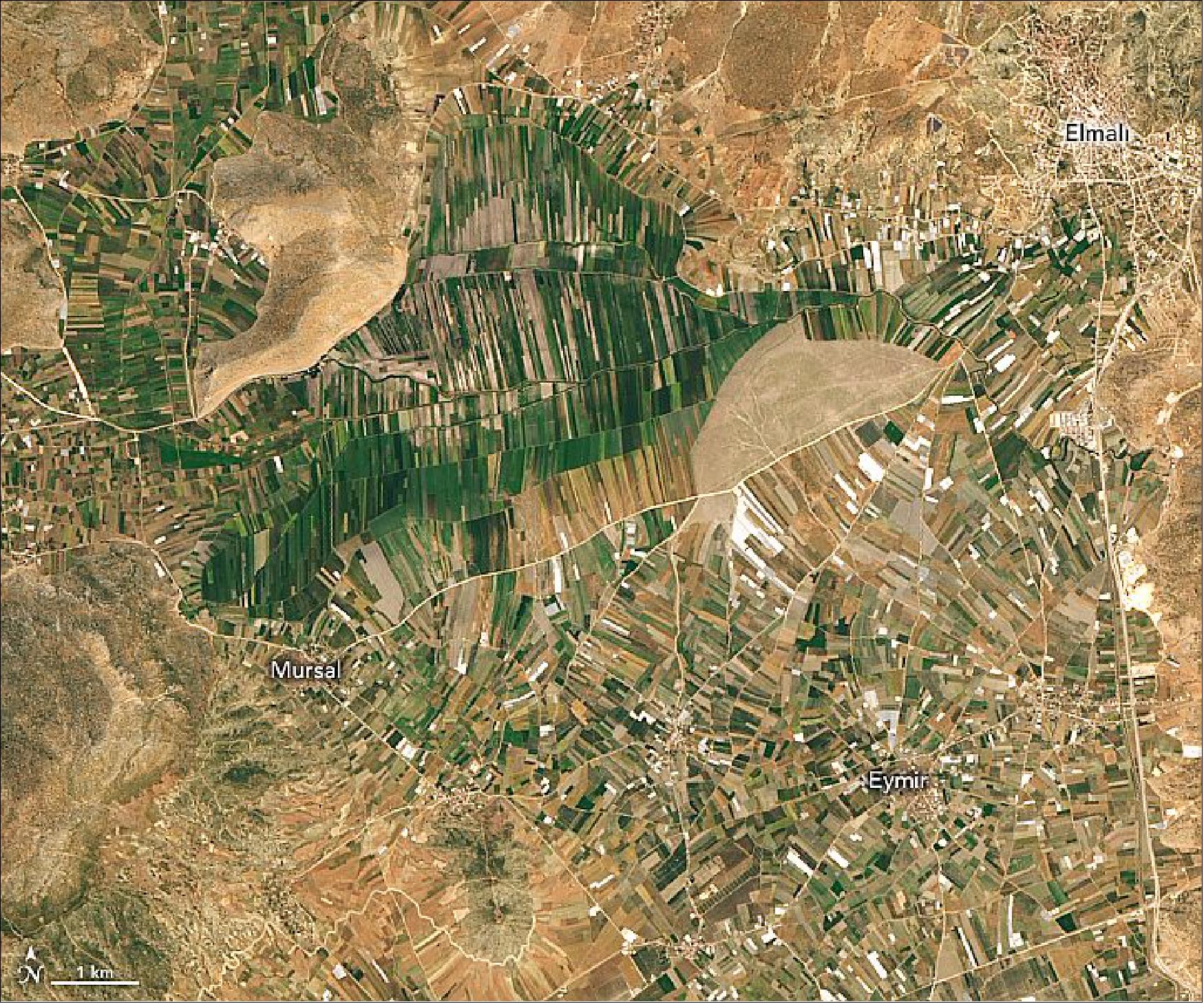 Figure 52: The images show two important agricultural districts of the Antalya province as they appeared on June 8, 2020, to the OLI on Landsat-8. Crop production in Antalya is valued around $270 million. This map shows farms in the district of Elmalı, where the town of the same name sits at the top of a long upland valley. Elmalı, which means “apple,” produces around 12 percent of Turkey’s apples, as well as the local chickpea snack leblebi (NASA Earth Observatory, images by Lauren Dauphin, using Landsat data from the U.S. Geological Survey. Story by Kasha Patel)