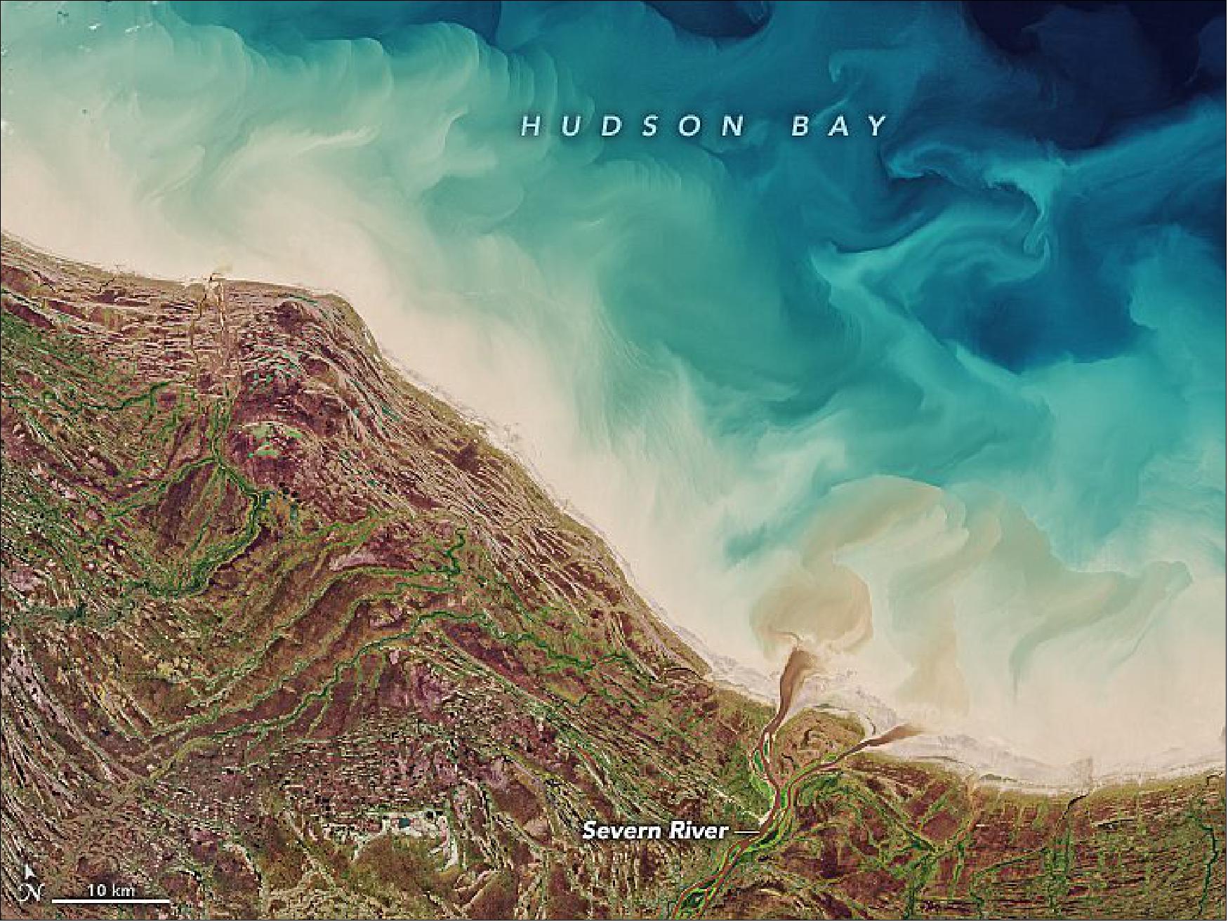 Figure 25: Located in northeastern Canada, just south of the Arctic Circle, Hudson Bay is the world’s second-largest bay and spans 1,230,000 km2. This image, acquired on September 19, 2020, with the Operational Land Imager (OLI) on Landsat-8, shows the bay’s southern side where it is bordered by Ontario Province. Raised beaches around the bay show how the landscape responded after the last ice age (image credit: NASA Earth Observatory, image by Joshua Stevens, using Landsat data from the U.S. Geological Survey. Story by Kathryn Hansen, with image interpretation by Lynda Dredge/Geological Survey of Canada, and Robie Macdonald/University of Manitoba)