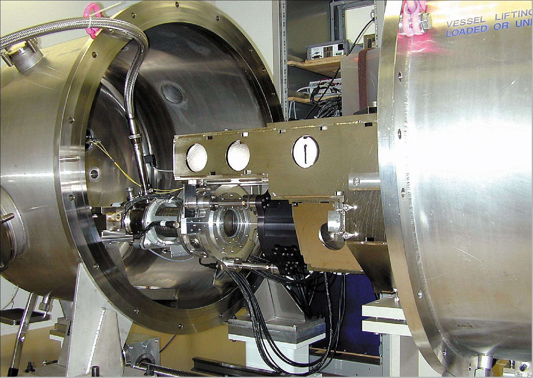 Figure 5: The HARPS spectrograph during laboratory tests. The vacuum tank is open so that some of the high-precision components inside can be seen (image credit: ESO)
